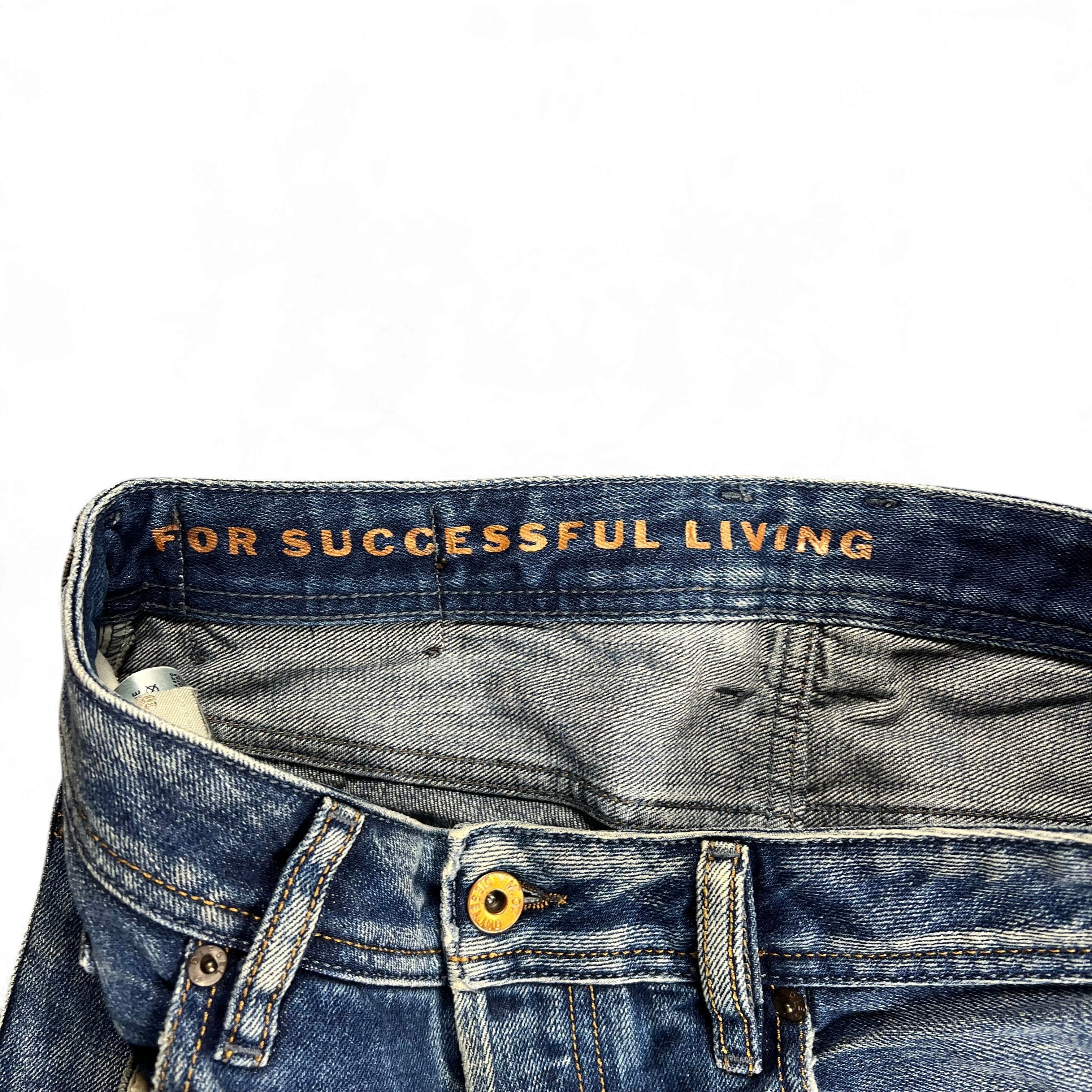 TWC Vintage Diesel Zatiny Bootcut Jeans in verwaschenem Blau mit For Successful Living Schriftzug am Innenbund