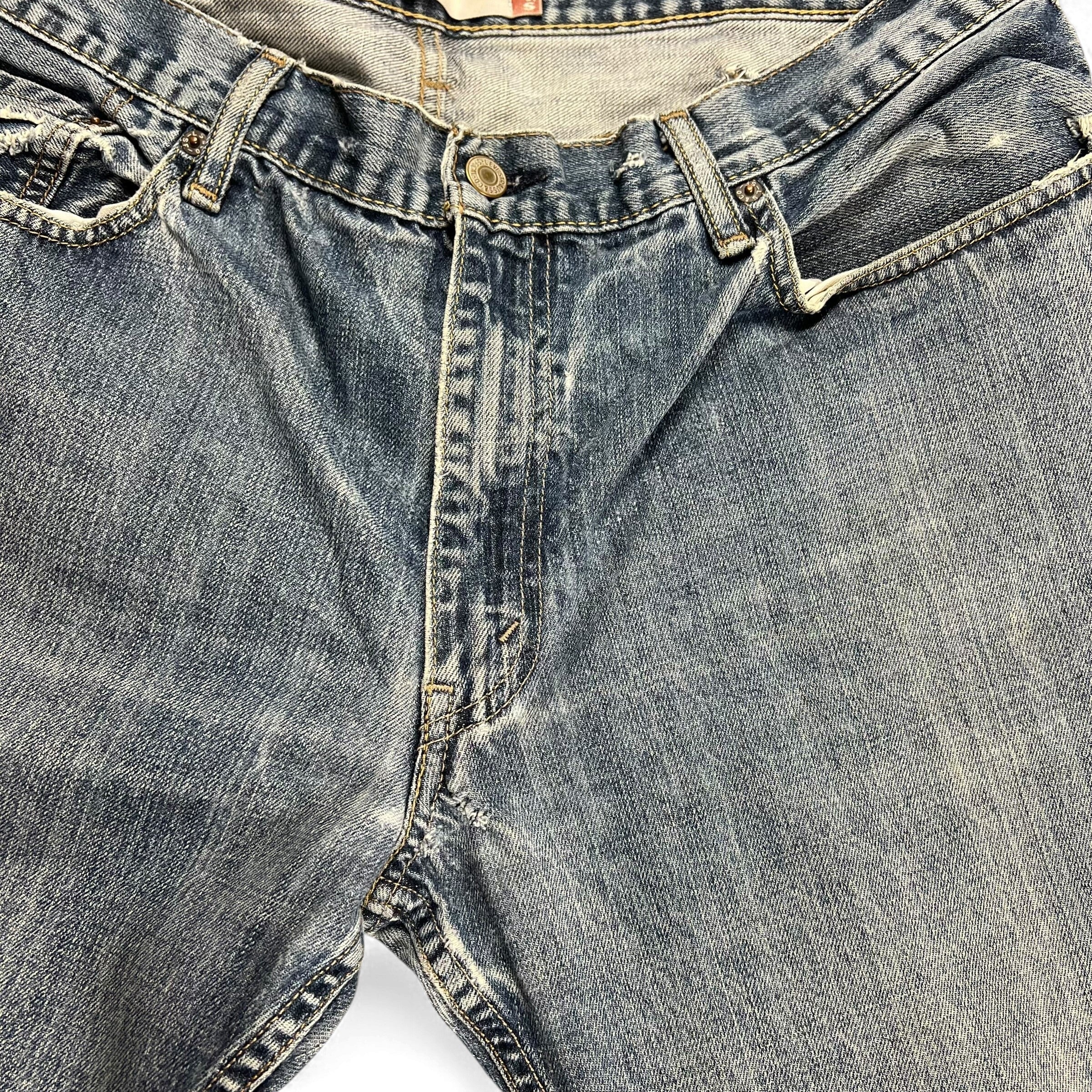 TWC Vintage Levi’s 527 Loose Bootcut Jeans in verwaschenem Blau mit klassischem Knopfverschluss und Used-Look