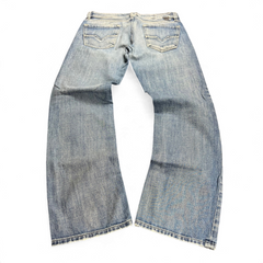 TWC Vintage Diesel Larkee Straight Jeans in hellblauem Denim mit klassischer Waschung und Gesäßtaschen