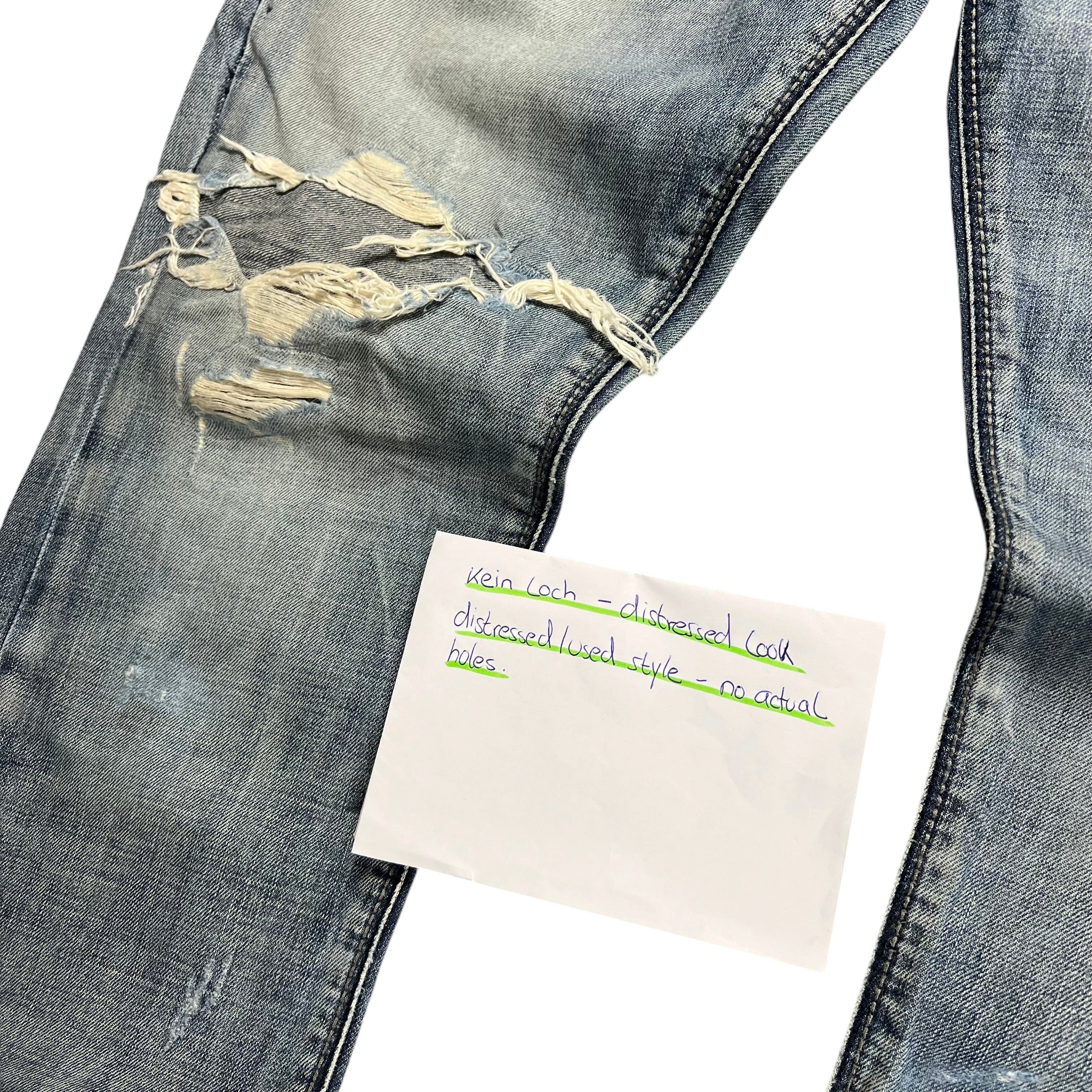 TWC Vintage Evisu Straight Jeans in verwaschenem Blau mit Distressed-Optik und abgenutzten Details am Knie