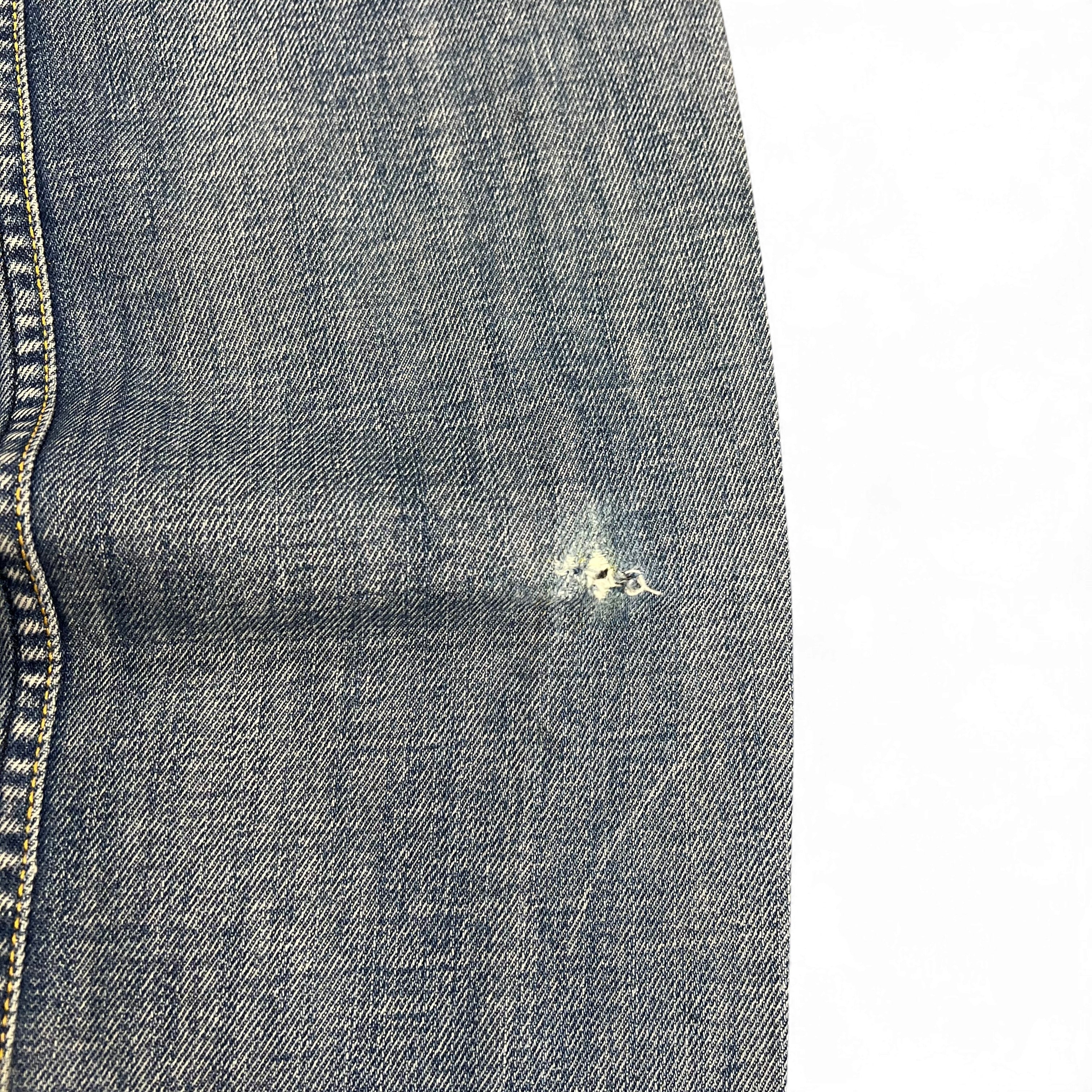 TWC Vintage Diesel Safado Jeans aus blauem Denim mit sichtbarem Abnutzungsdetail am Bein