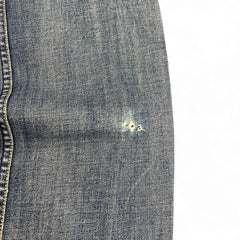 TWC Vintage Diesel Safado Jeans aus blauem Denim mit sichtbarem Abnutzungsdetail am Bein