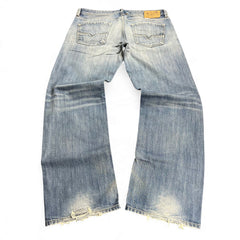 TWC Vintage Diesel Larkee Straight Jeans in hellblauem Denim mit Used-Look und ausgefransten Beinabschlüssen