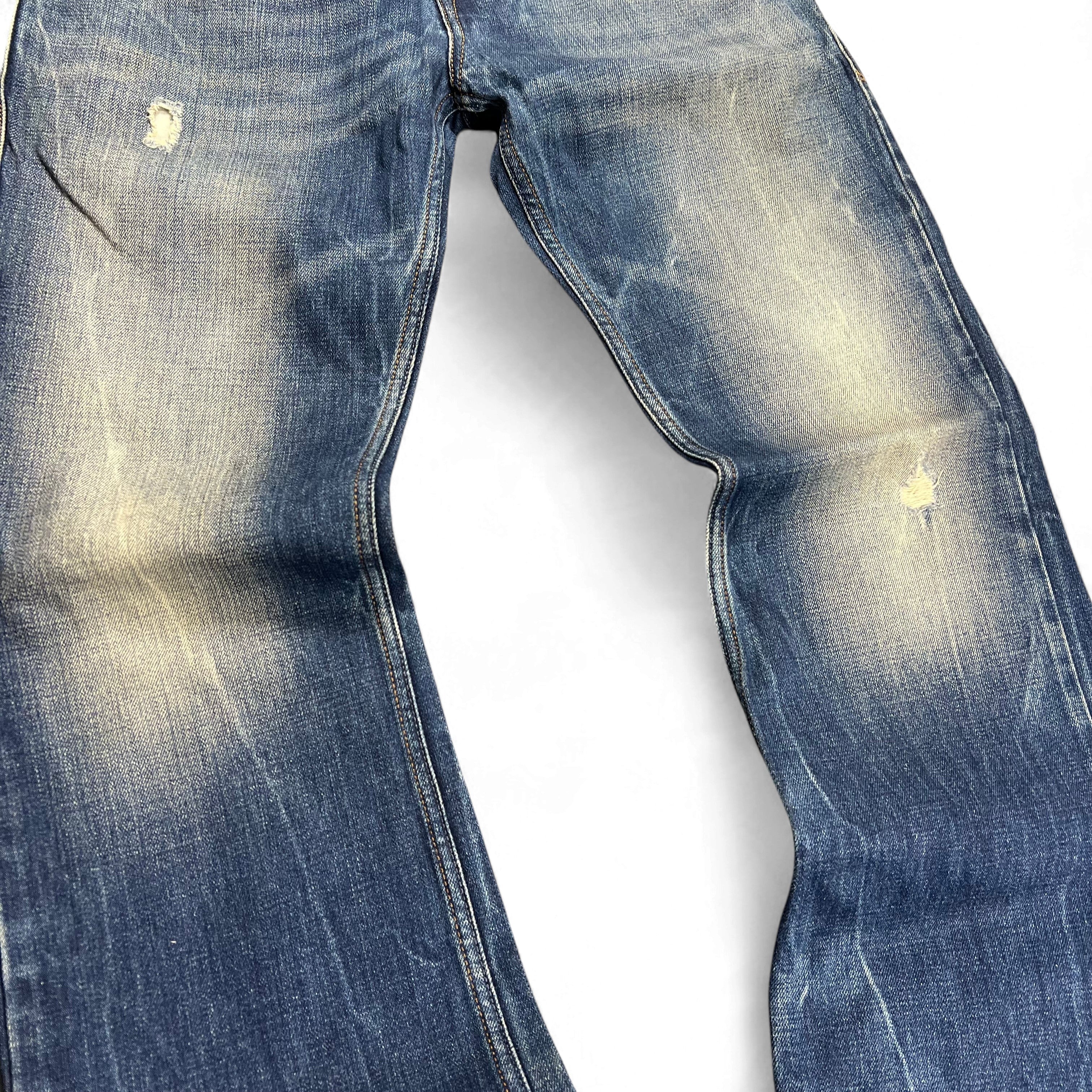 TWC Vintage Diesel Zatiny Bootcut Jeans in verwaschenem Blau mit Distressed-Details und Vintage-Waschung