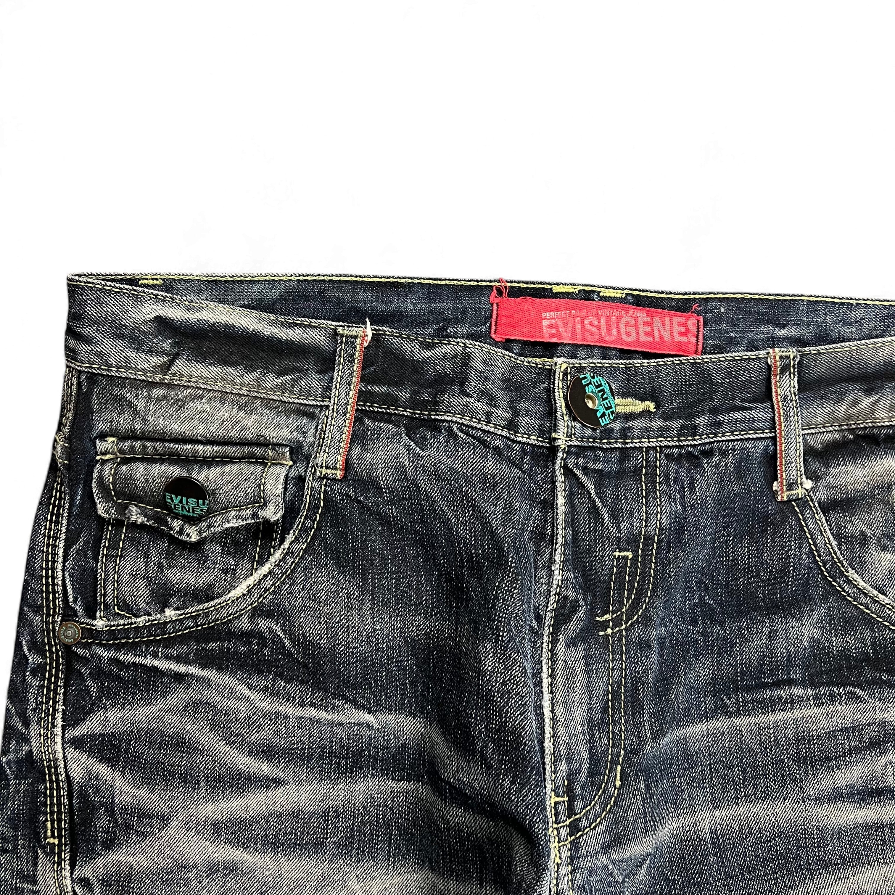 TWC Vintage Evisu KC Baggy Jeans in verwaschenem Dunkelblau mit rotem Markenlabel und Logo-Knöpfen