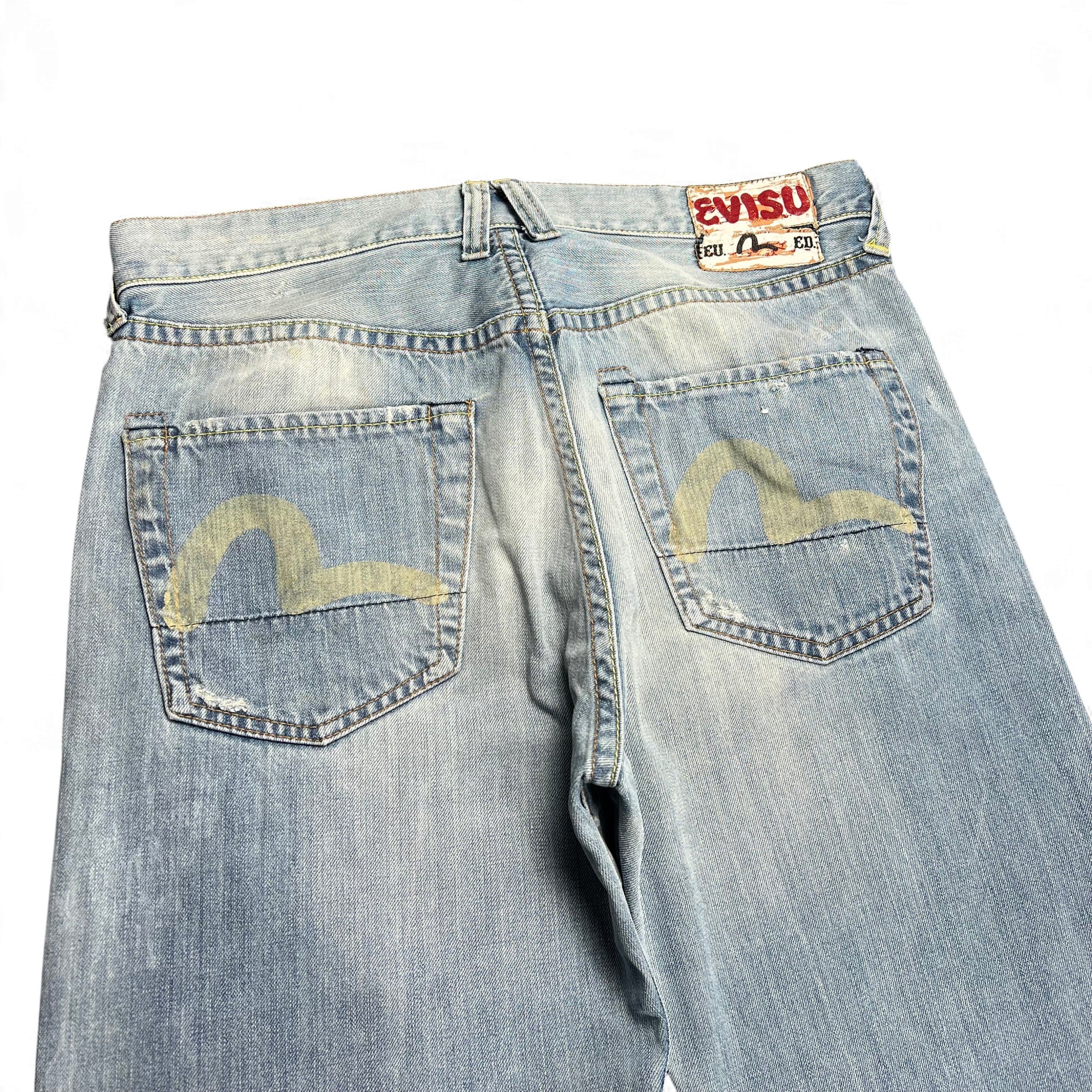 TWC Vintage Evisu Jeans mit geradem Schnitt, helle Waschung, Distressed-Optik und ikonischem Seagull-Print auf Taschen