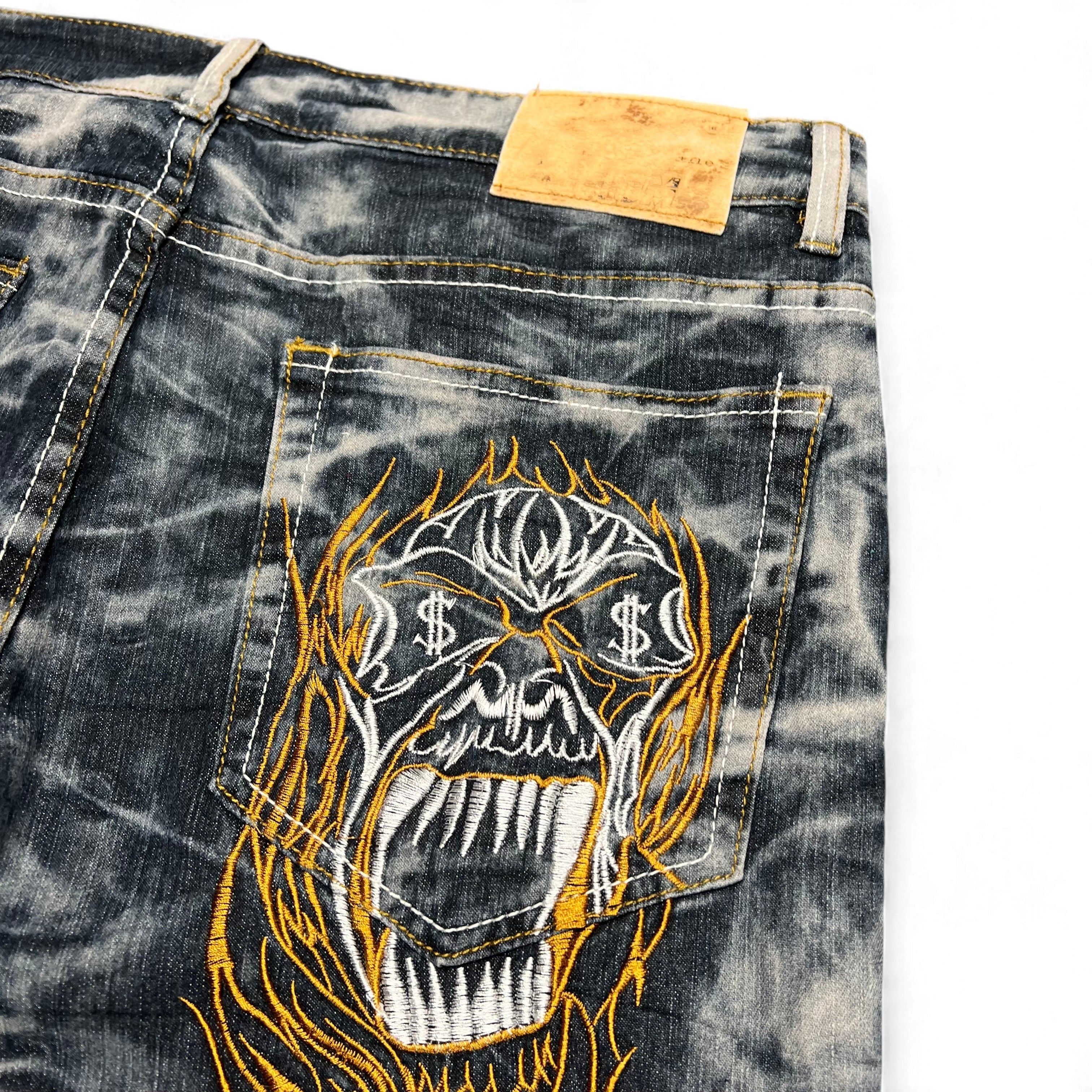 TWC Vintage japanische Denim-Jeans mit verwaschenem Look und auffälliger Totenkopf-Stickerei auf der Gesäßtasche