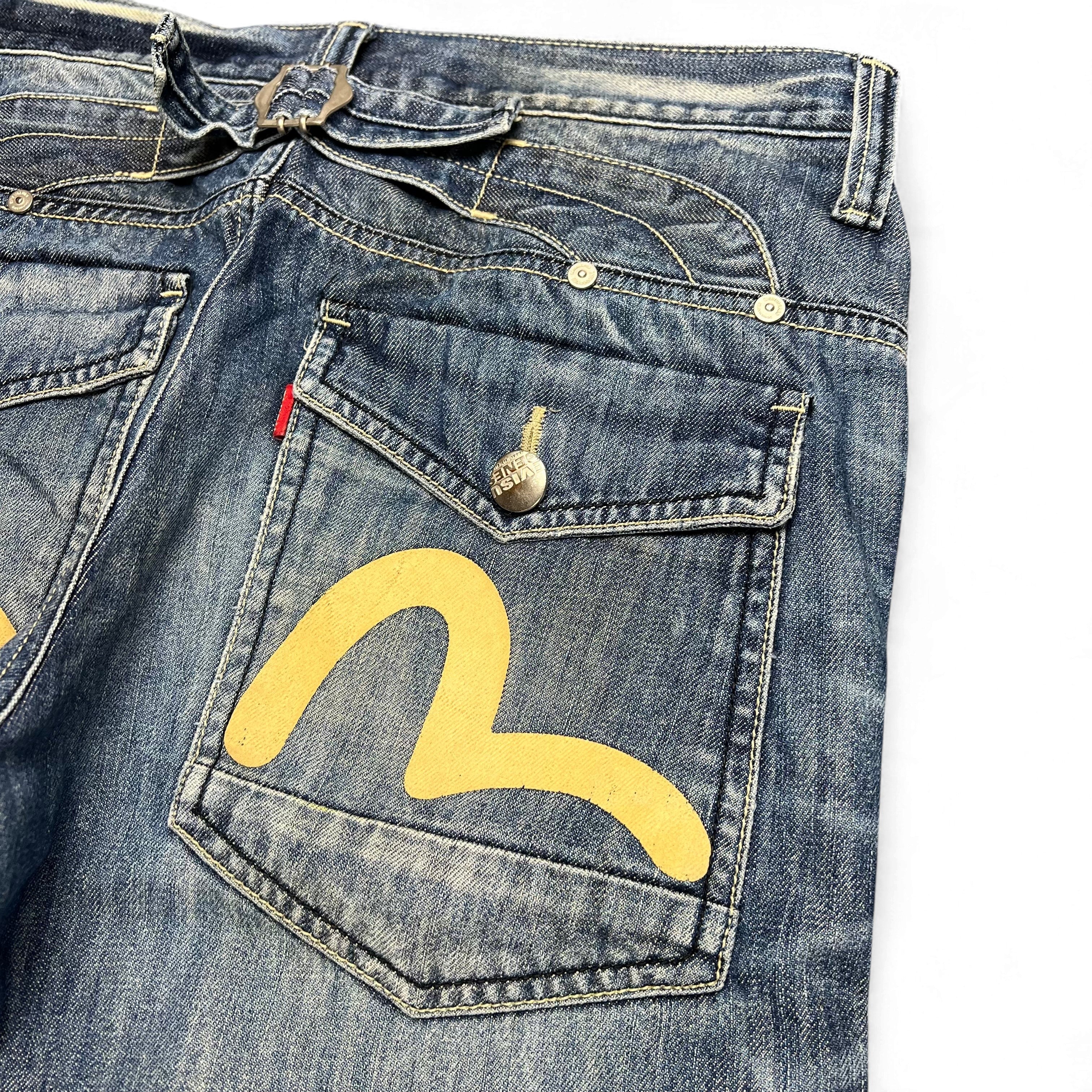TWC Vintage Evisu KC Straight Jeans in blauem Denim mit gelbem Seagull-Logo auf der Gesäßtasche und Schnallen-Detail