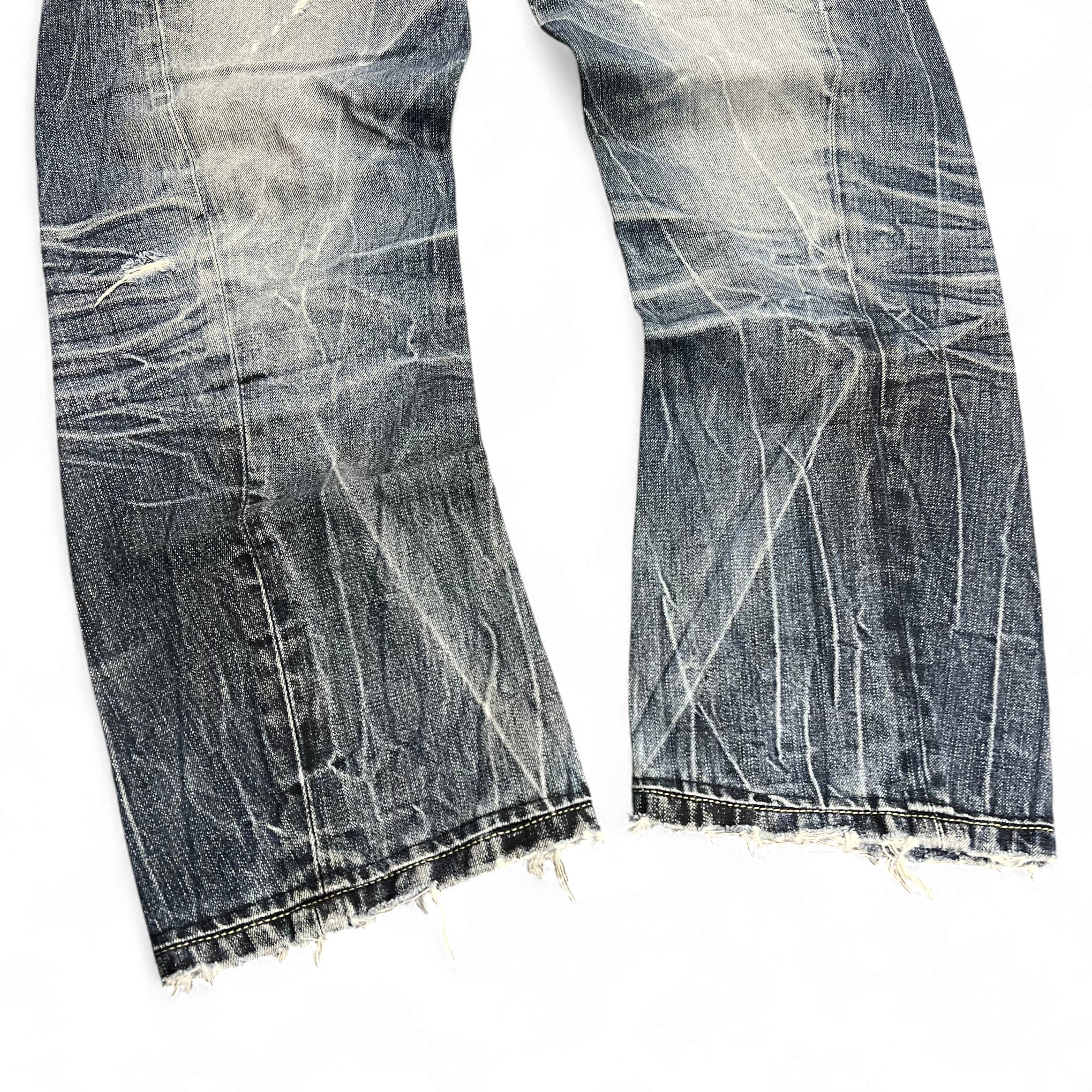 TWC Vintage Evisu KC Baggy Jeans mit verwaschener blauer Denim-Optik und ausgefransten Beinabschlüssen