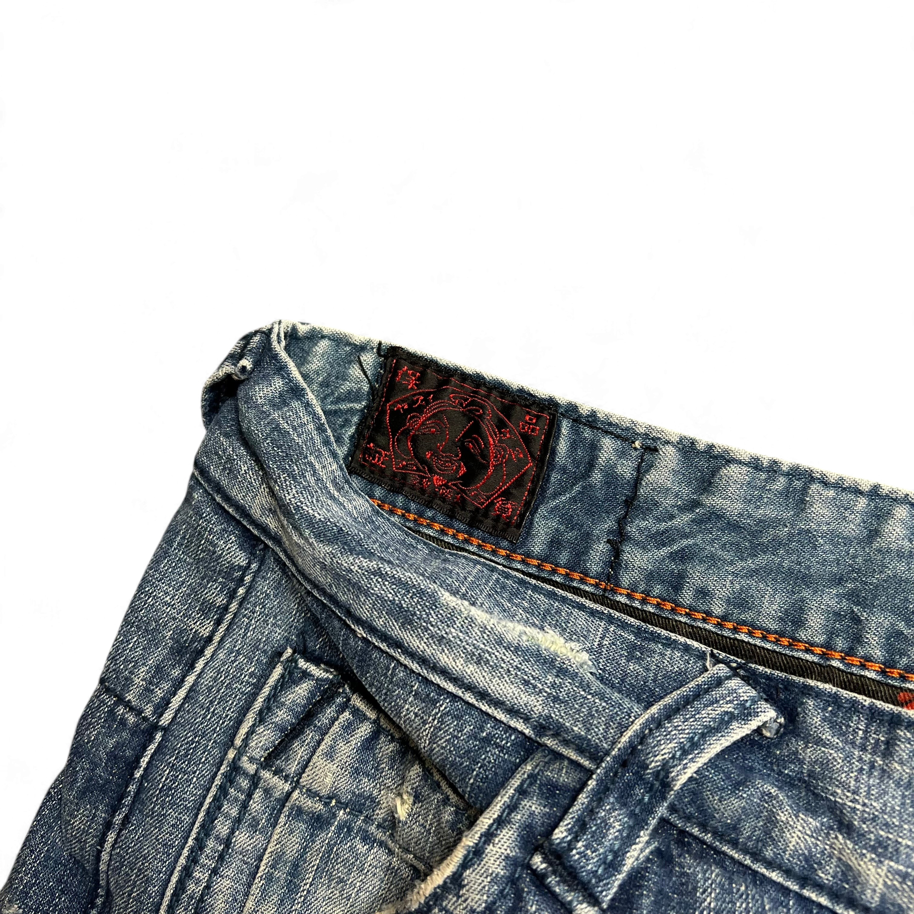 TWC Vintage Evisu Baggy Jeans mit rotem Logo-Label am Bund aus verwaschenem blauem Denim