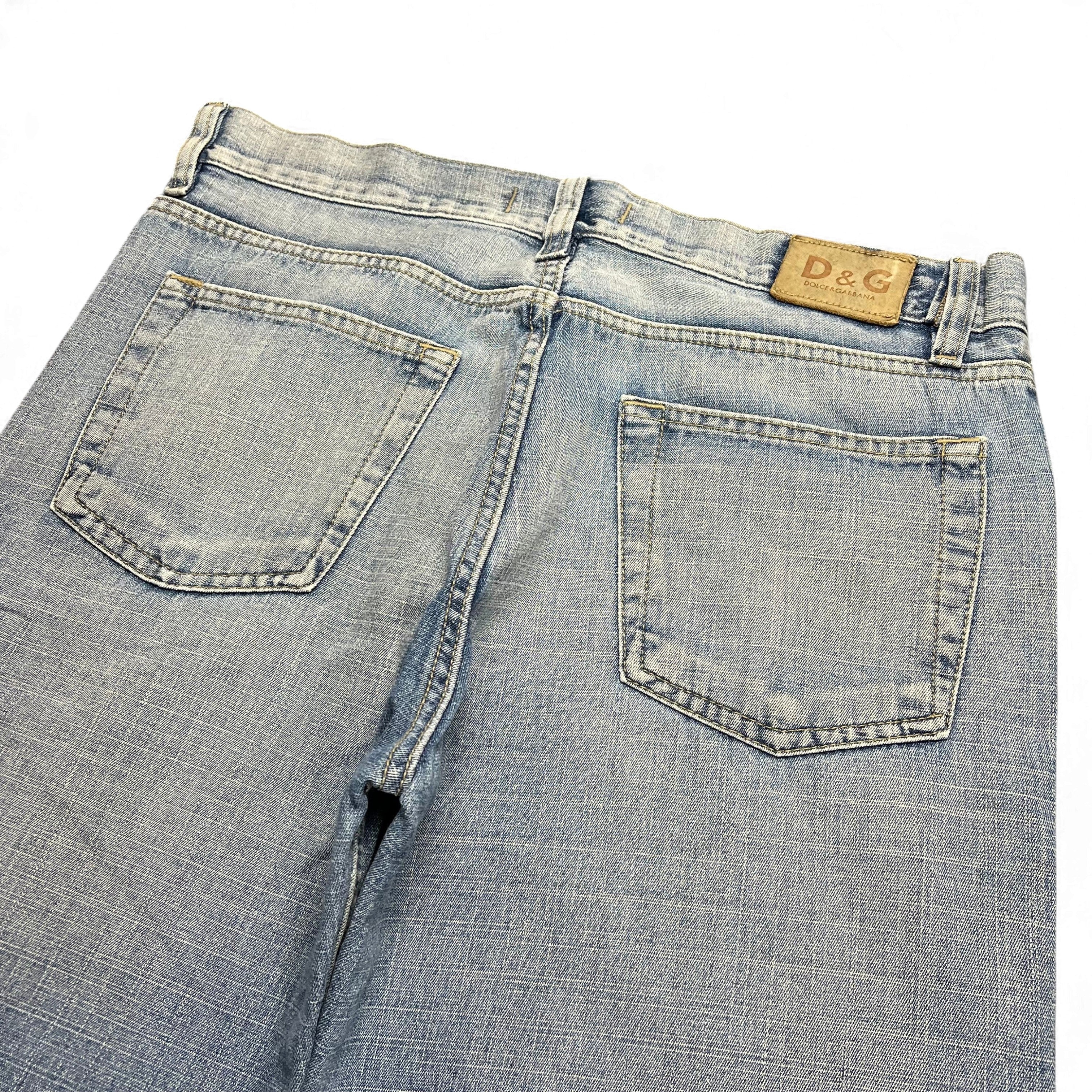 TWC Vintage Dolce&Gabbana Baggy Jeans in hellblauem Denim mit D&G Lederpatch an der Rückseite