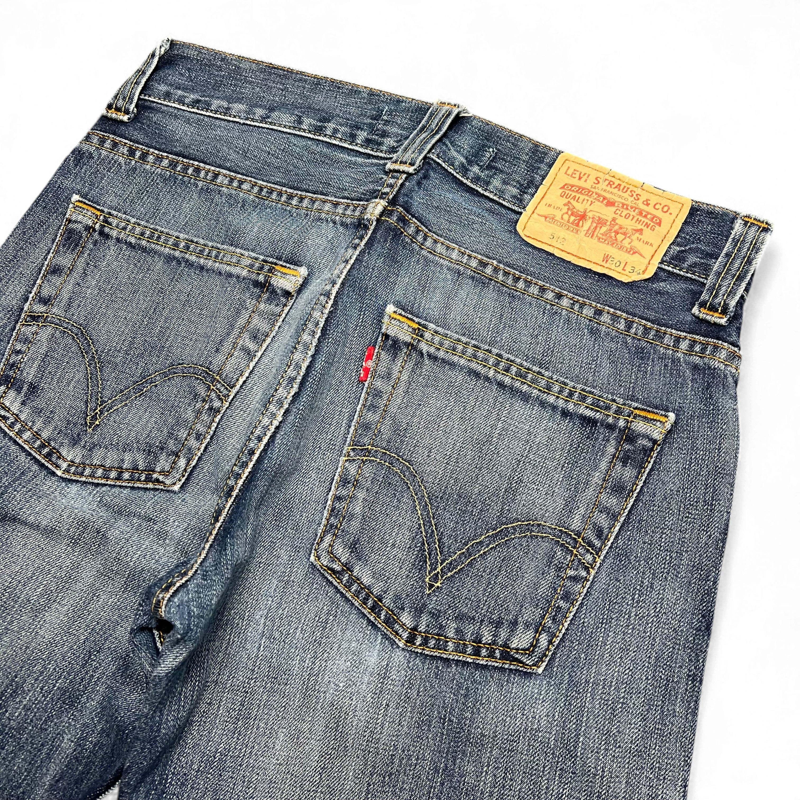 TWC Vintage Levi's 512 Jeans in verwaschenem Blau mit klassischem Lederpatch und Gesäßtaschen