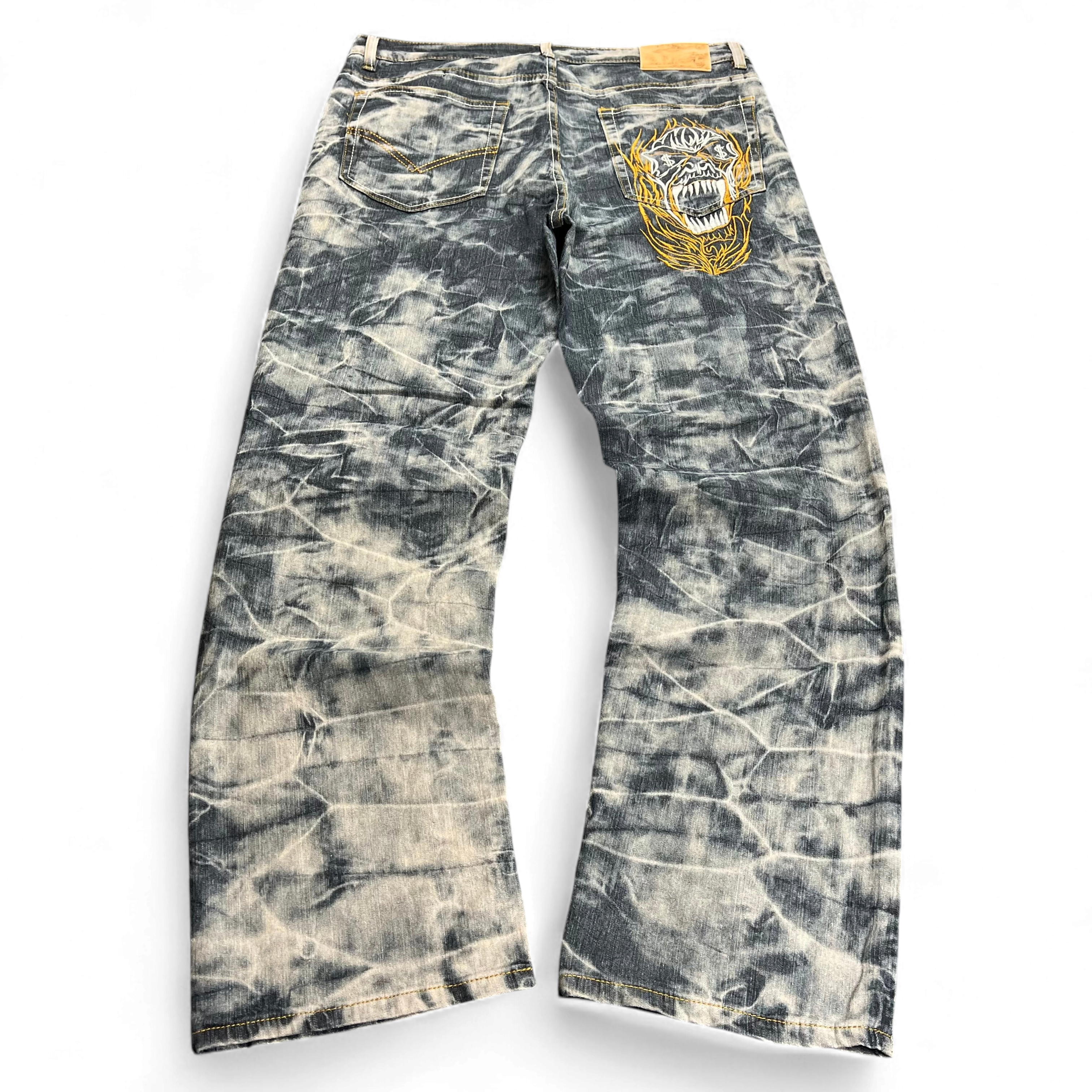 TWC Vintage japanische Jeans mit Acid-Wash-Optik und grafischem Stickmotiv auf der Gesäßtasche
