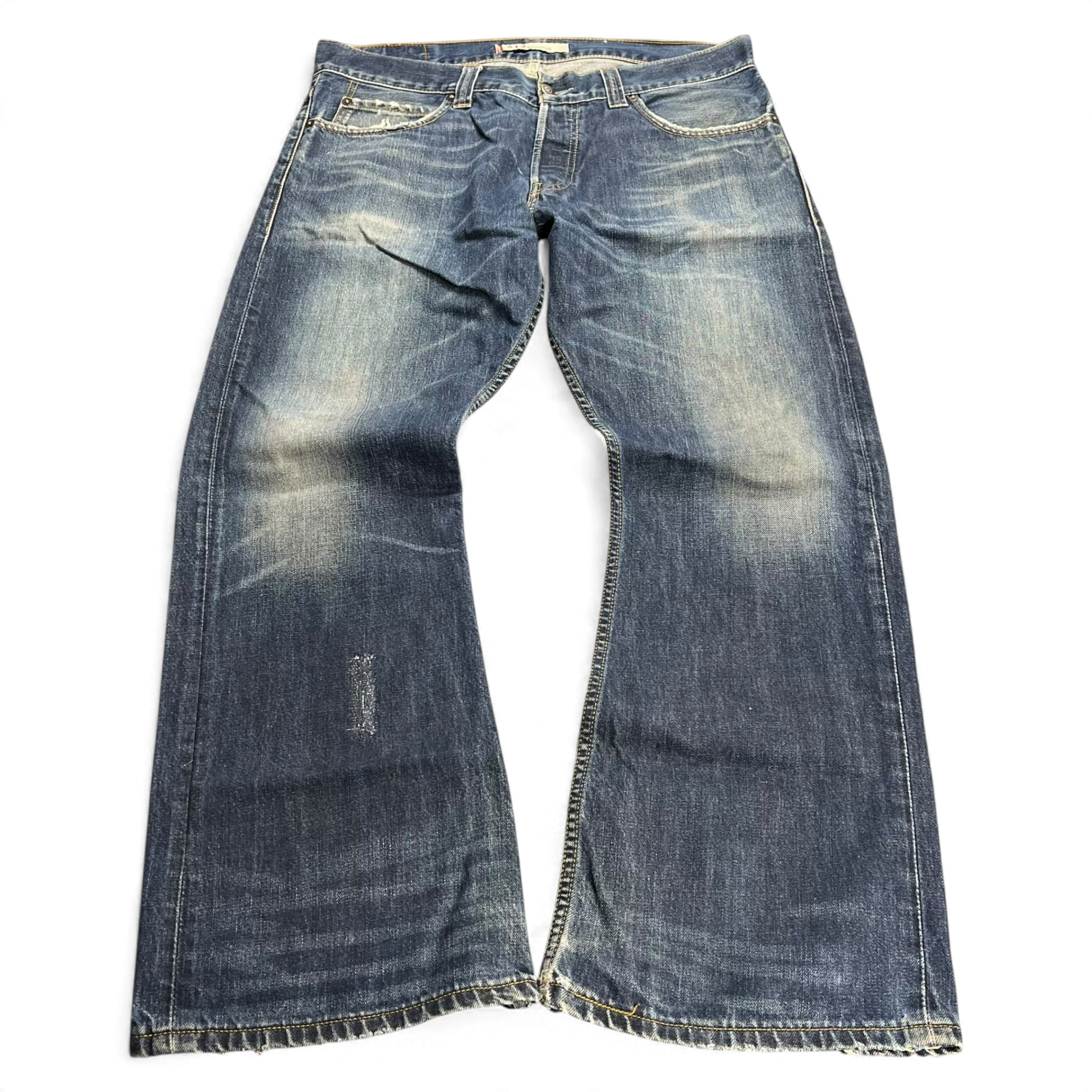 TWC Vintage Levi’s 512 Bootcut Jeans in verwaschenem Blau mit Used-Look und ausgefransten Säumen