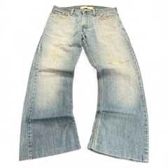 TWC Vintage Levi's 527 Bootcut Jeans in hellblauem Denim mit Used-Look und ausgefransten Beinabschlüssen