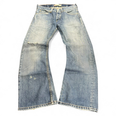 TWC Vintage Levi’s 512 Bootcut Jeans in dirty wash denim with distressed details and frayed hems