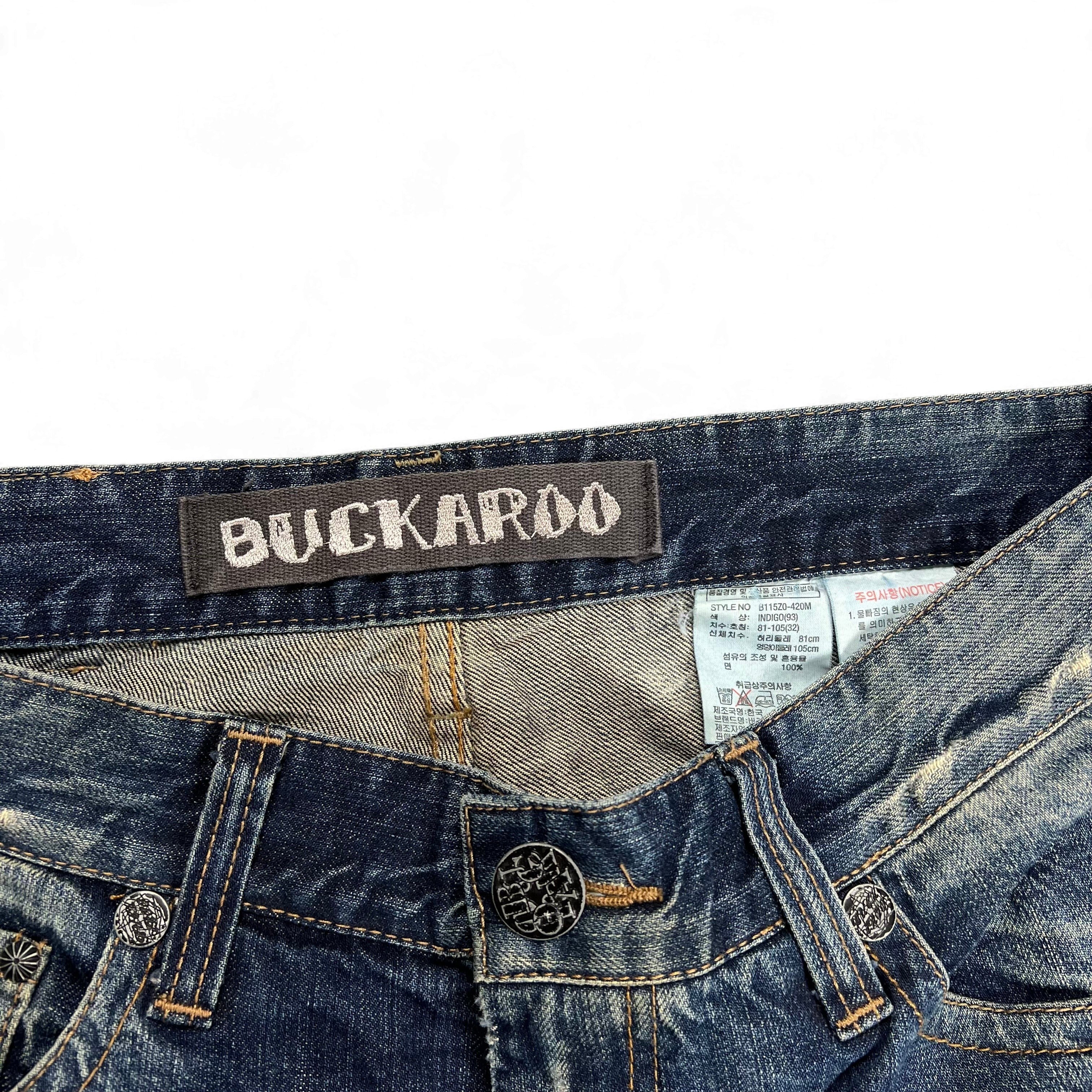 TWC Vintage Buckaroo Bootcut Jeans mit verwaschener Indigo-Optik und Markenlabel am Bund