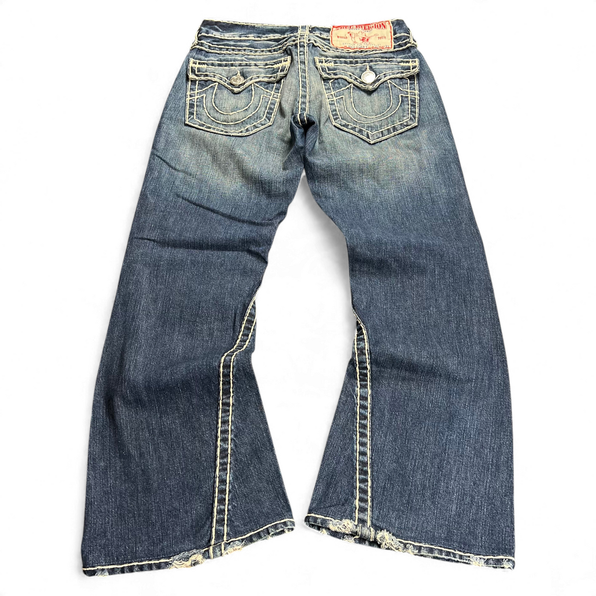 TWC Vintage True Religion Joey Super T Bootcut Jeans in blauem Denim mit markanten Kontrastnähten und Used-Look