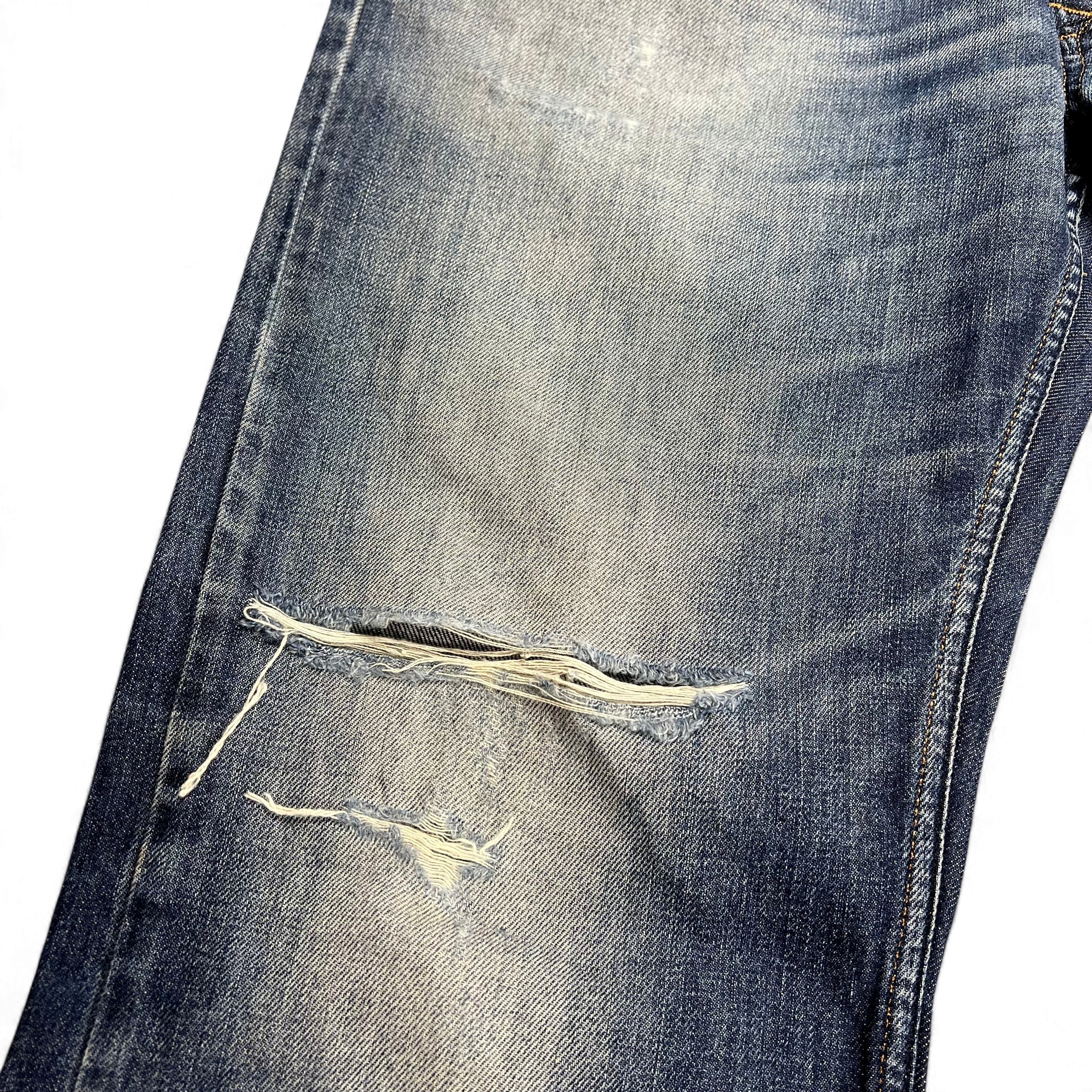 TWC Vintage Diesel Larkee Straight Jeans in blauem Denim mit Distressed-Details und Rissen am Knie