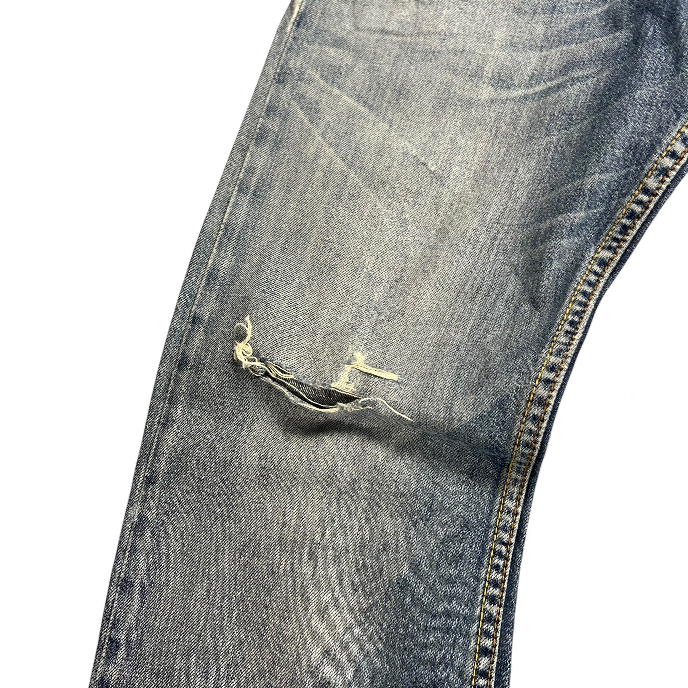 TWC Vintage Levi’s 512 Bootcut Jeans in dirty wash denim with distressed knee detail and vintage fade