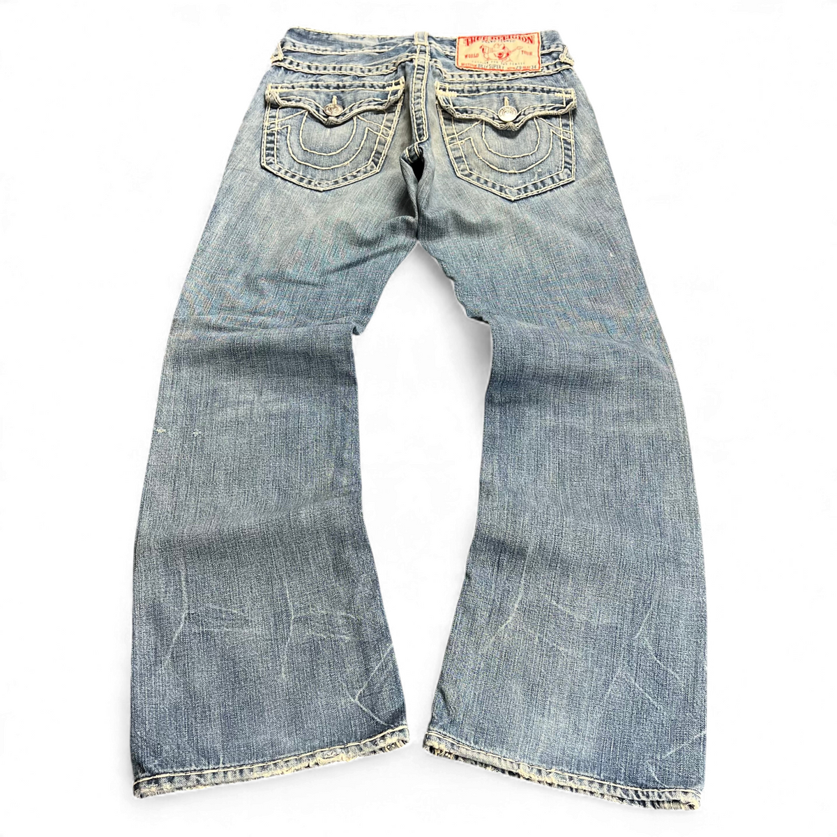 TWC Vintage True Religion Joey Super T Bootcut Jeans in verwaschenem Blau mit markanten Nähten und Lederpatch