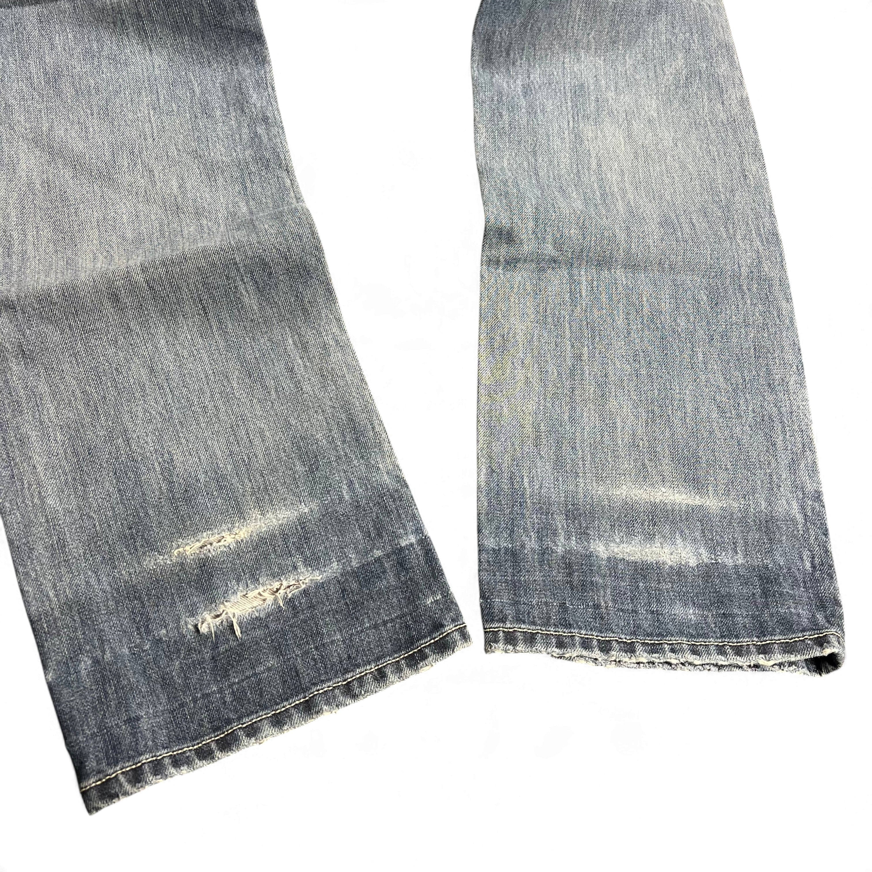 TWC Vintage Diesel Straight Jeans in verwaschenem Blau mit Distressed-Details und ausgefransten Säumen