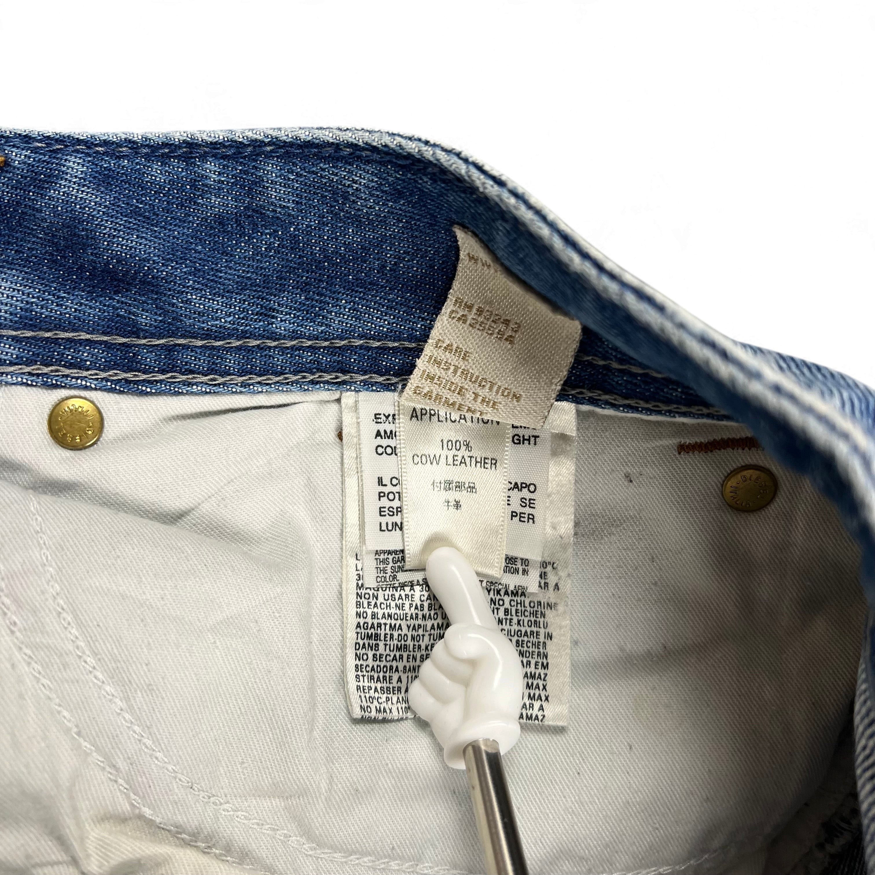 TWC Vintage Diesel Zaghor Bootcut Jeans Pflegeetikett mit Lederdetails und Nieten im Innenbereich