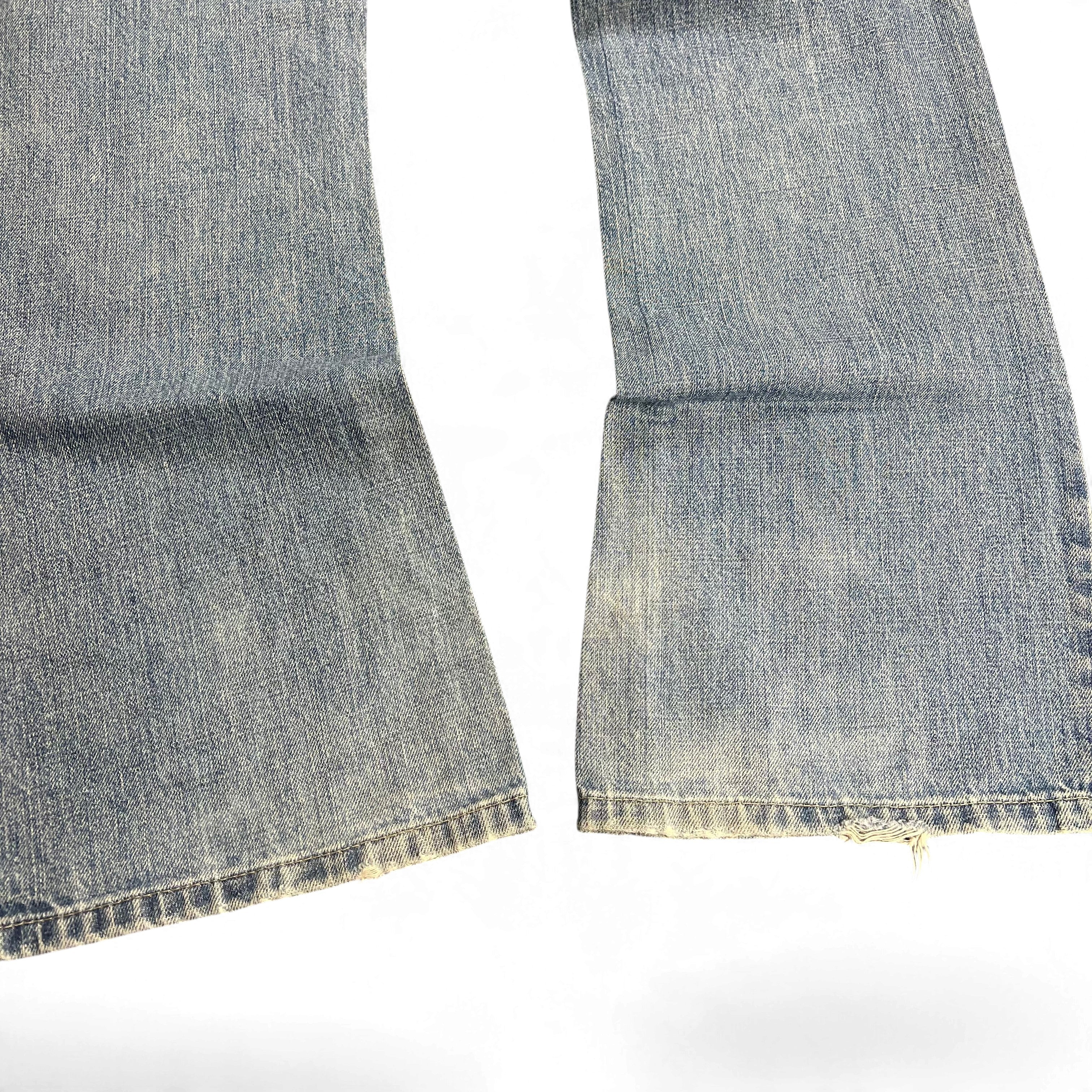 TWC Vintage Calvin Klein Bootcut Jeans aus blauem Denim mit leichtem Used-Look und ausgefransten Beinabschlüssen