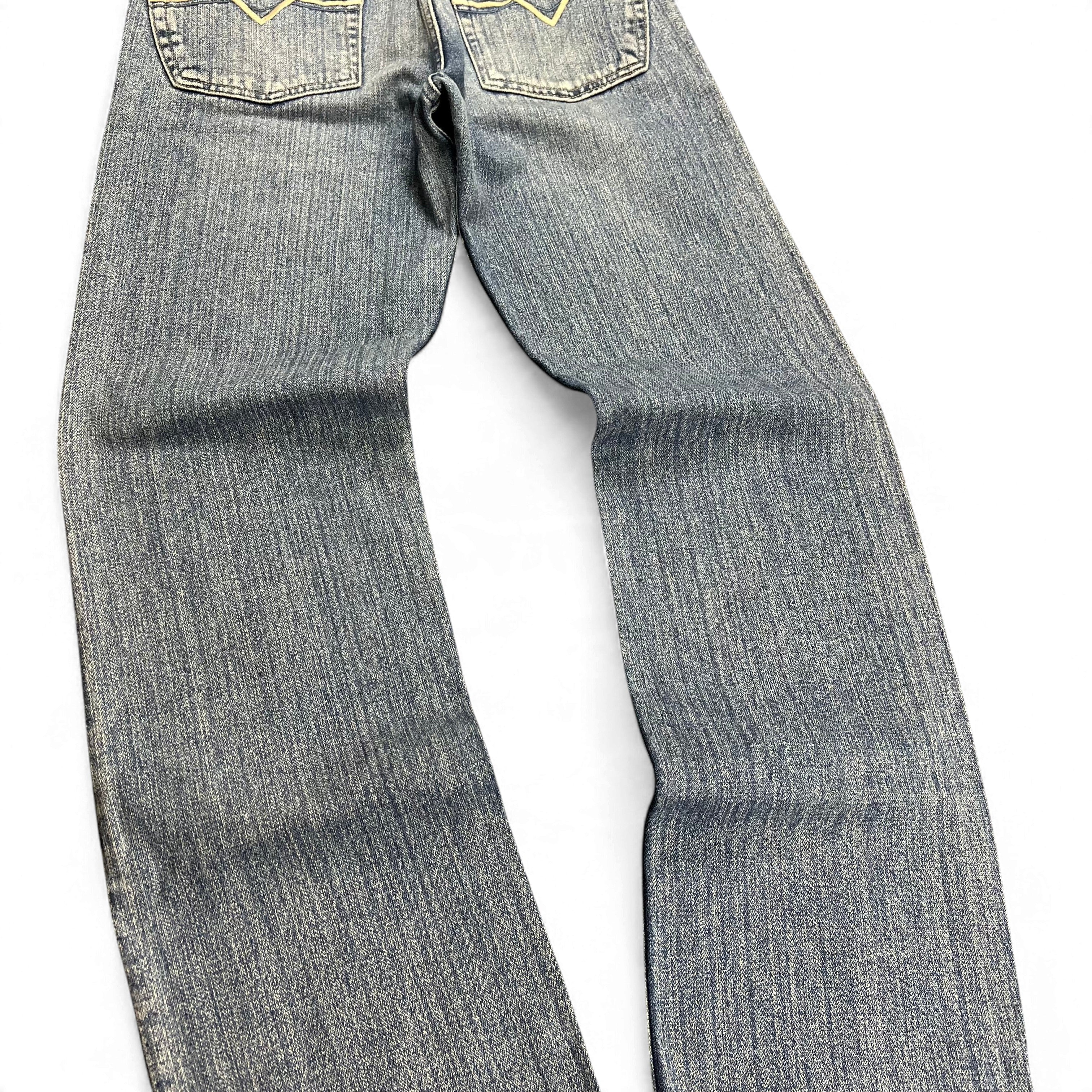 TWC Vintage Diesel Straight Jeans in verwaschenem Blau mit geradem Bein und markanten Gesäßtaschen