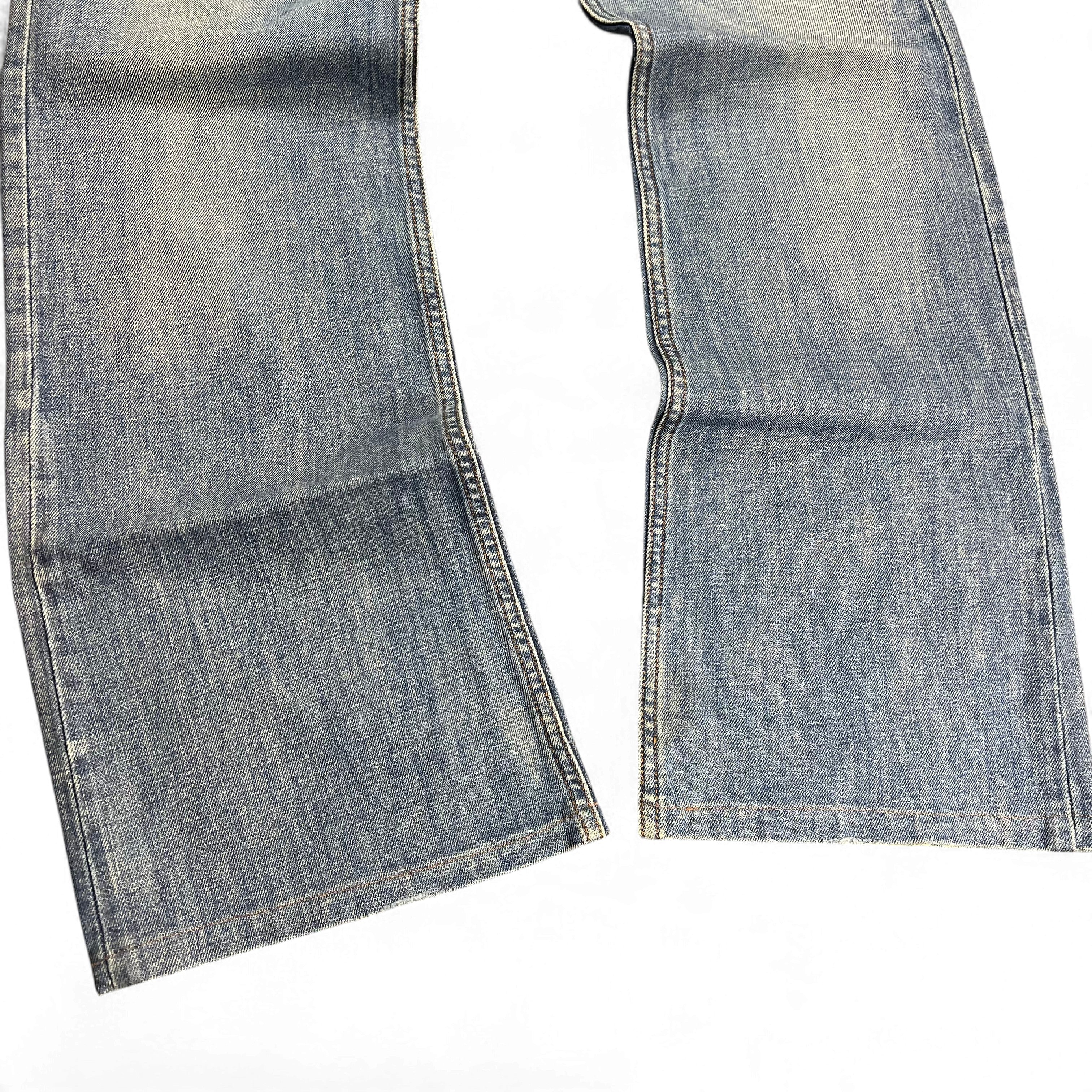 TWC Vintage Diesel Zaghor Bootcut Jeans mit verwaschener blauer Denim-Optik und ausgestelltem Bein