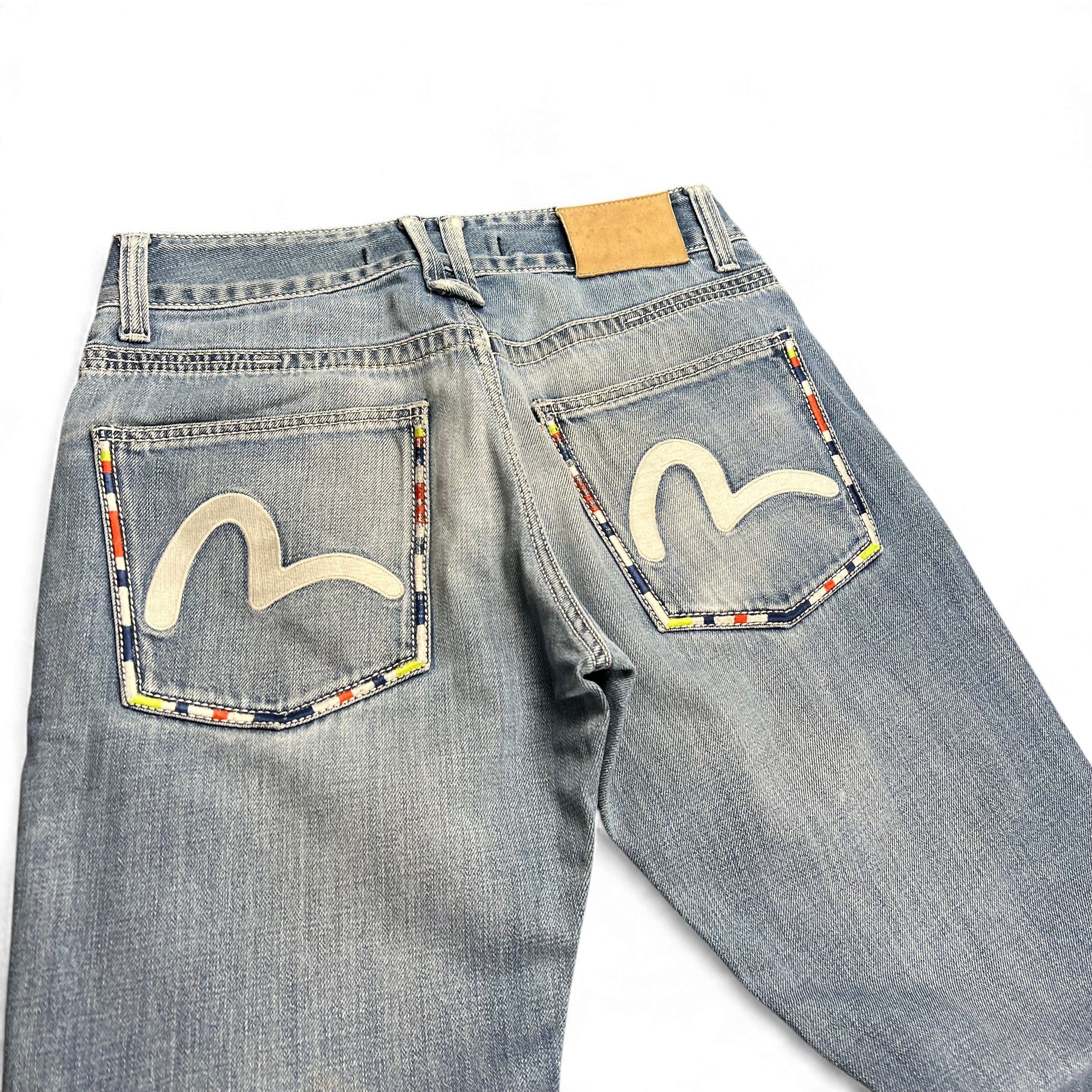 TWC Vintage Evisu KC Straight Jeans in hellblauem Denim mit ikonischem weißem Seagull-Logo und bunten Taschenrändern