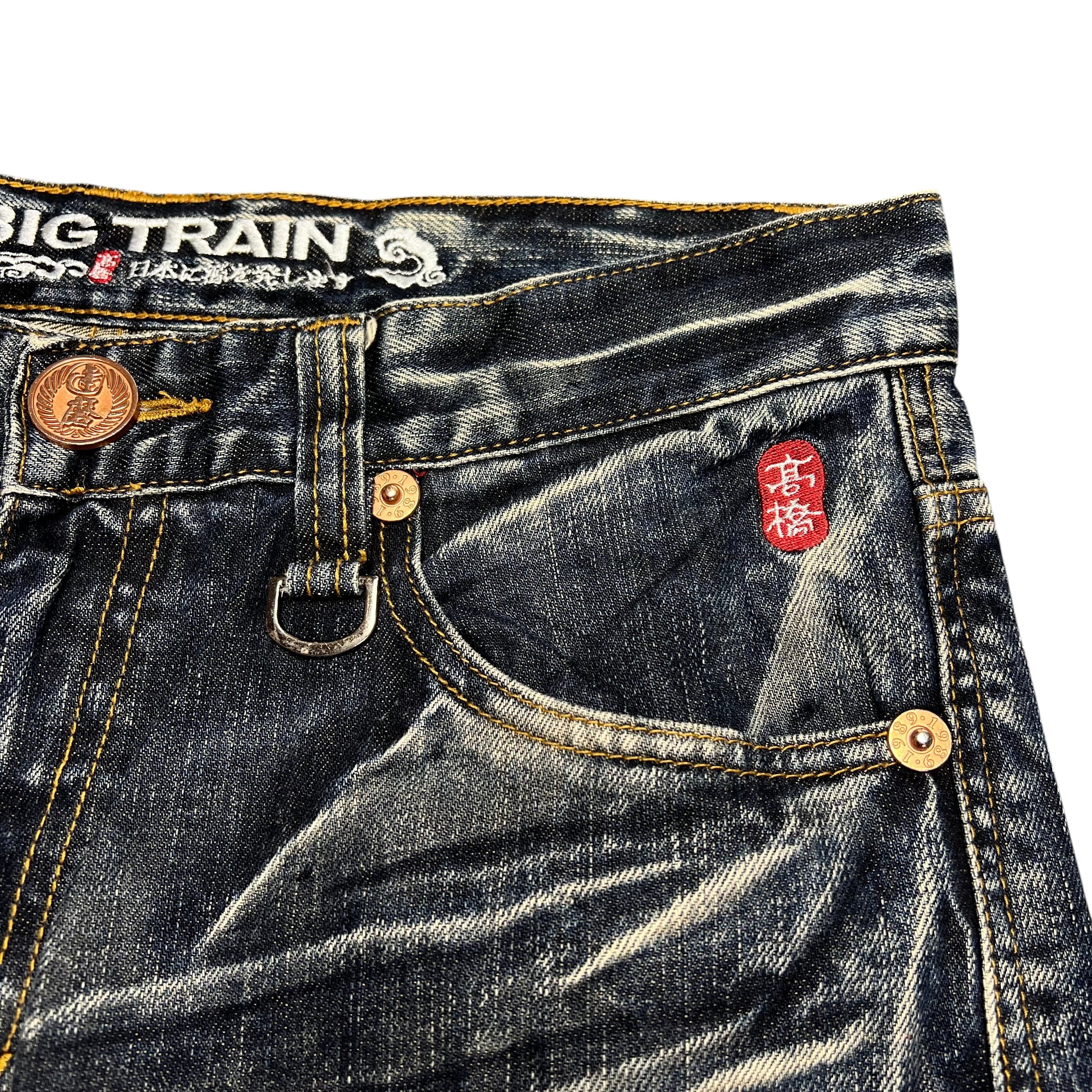 TWC Vintage Big Train Jeans mit dunkler Waschung, japanischer Stickerei und markanten Metalldetails