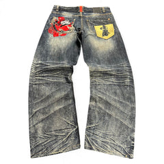 TWC Vintage Jeans mit japanischer Stickerei, verwaschenem Denim und auffälligen Gesäßtaschen-Details