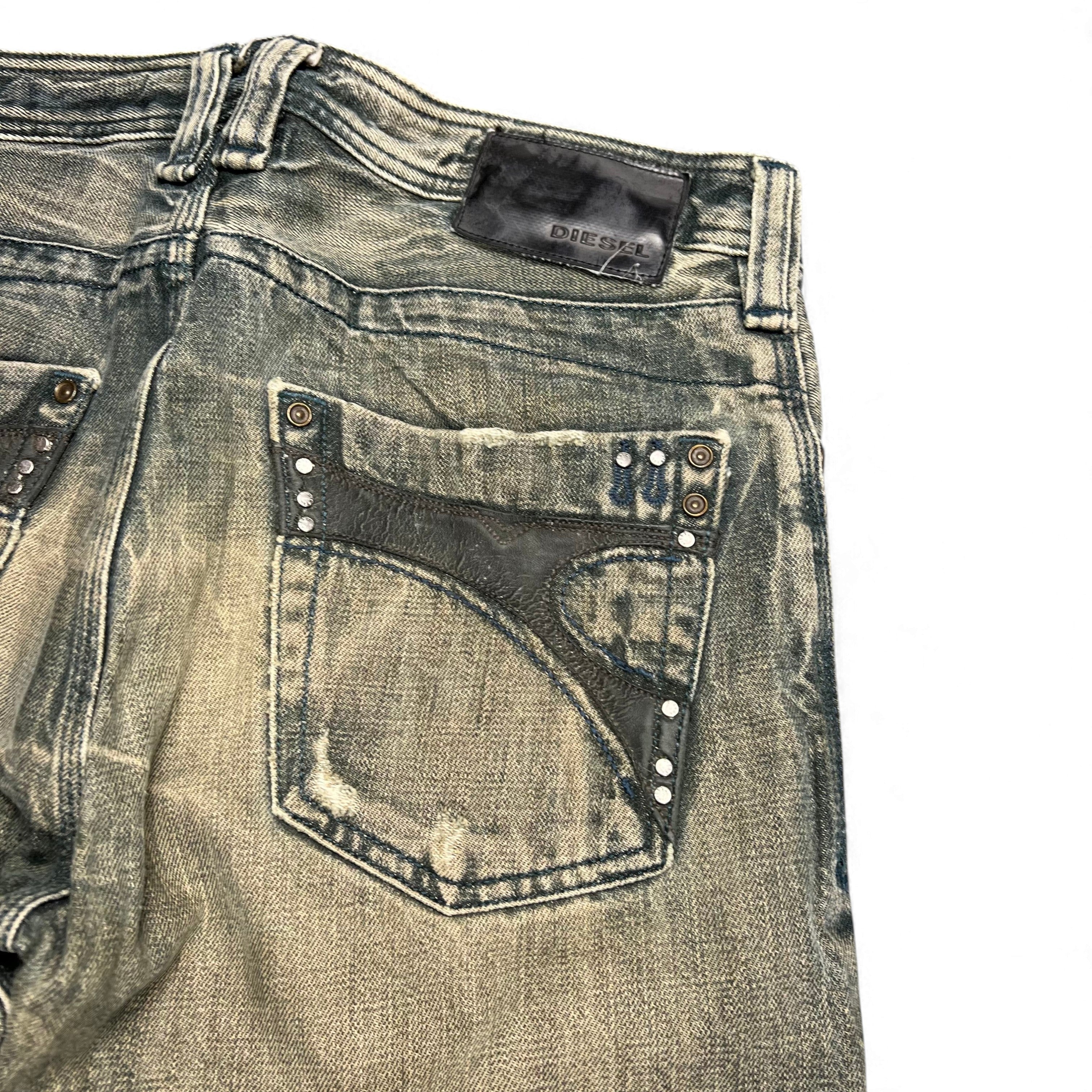 TWC Vintage Diesel Timmen Slim Jeans in verwaschenem Grün mit Lederdetails und Nieten an der Gesäßtasche