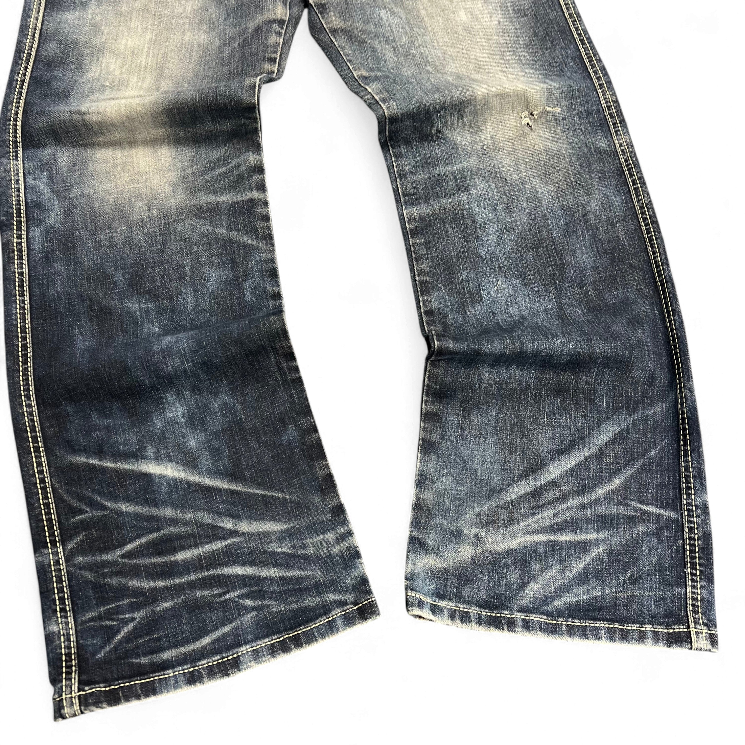TWC Vintage Evisu KC Baggy Jeans mit verwaschener blauer Waschung und markanten Tragespuren