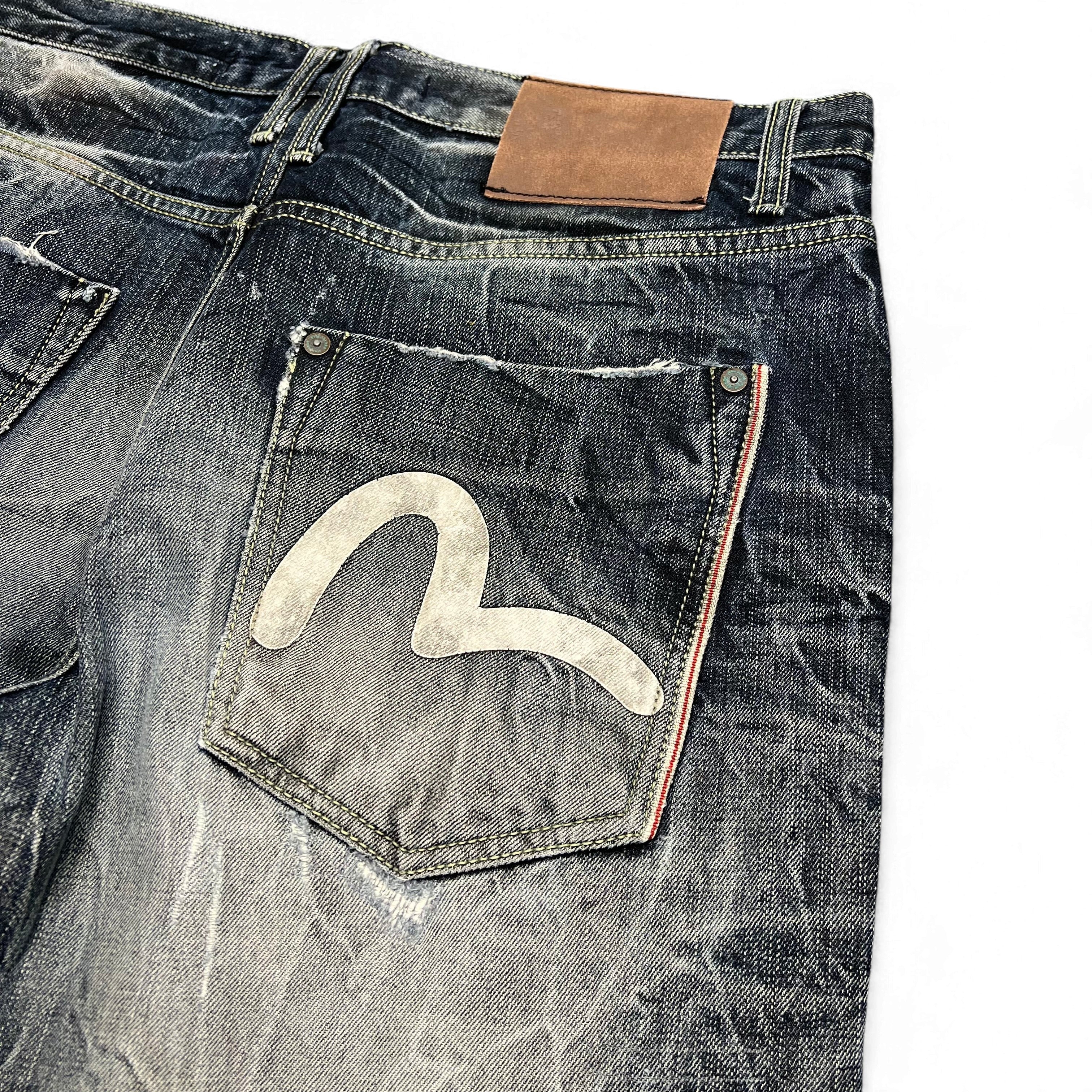 TWC Vintage Evisu KC Baggy Jeans in verwaschenem Denim mit ikonischem weißem Seagull-Logo auf der Gesäßtasche