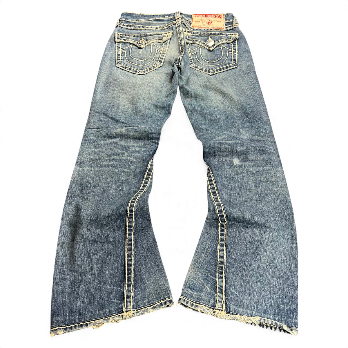 TWC Vintage True Religion Joey Super T Bootcut Jeans in blau mit markanten Kontrastnähten und ausgefranstem Saum