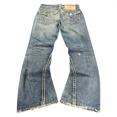 TWC Vintage True Religion Joey Super T Bootcut Jeans in blau mit markanten Kontrastnähten und ausgefranstem Saum