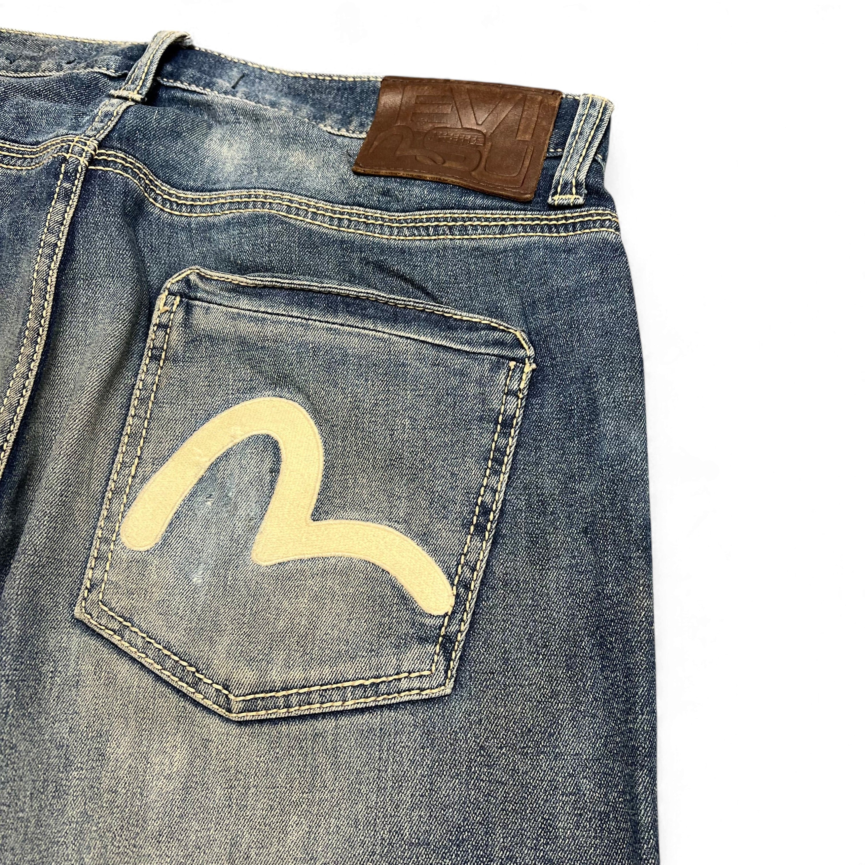 TWC Vintage Evisu KC Straight Jeans in verwaschenem Blau mit ikonischem weißem Möwen-Logo auf der Gesäßtasche