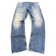 TWC Vintage Diesel Straight Jeans in verwaschenem Blau mit Distressed-Details und geradem Bein