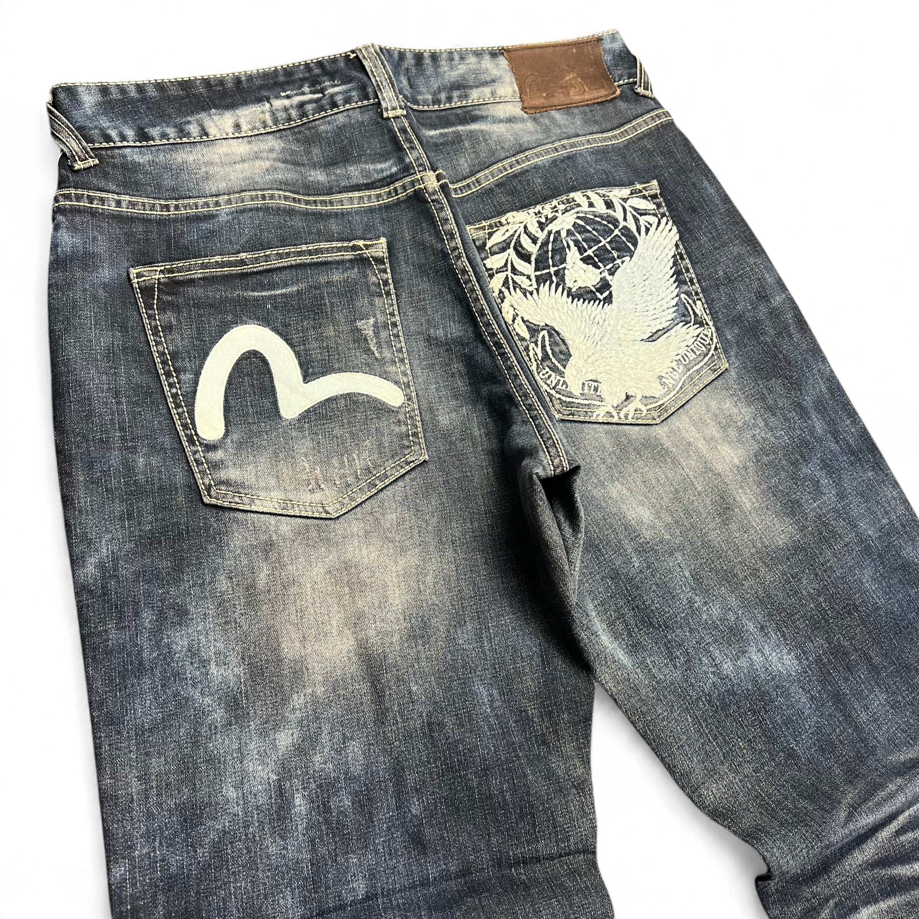 TWC Vintage Evisu KC Baggy Jeans in verwaschenem Dunkelblau mit ikonischem Seagull-Logo und Adler-Stickerei hinten