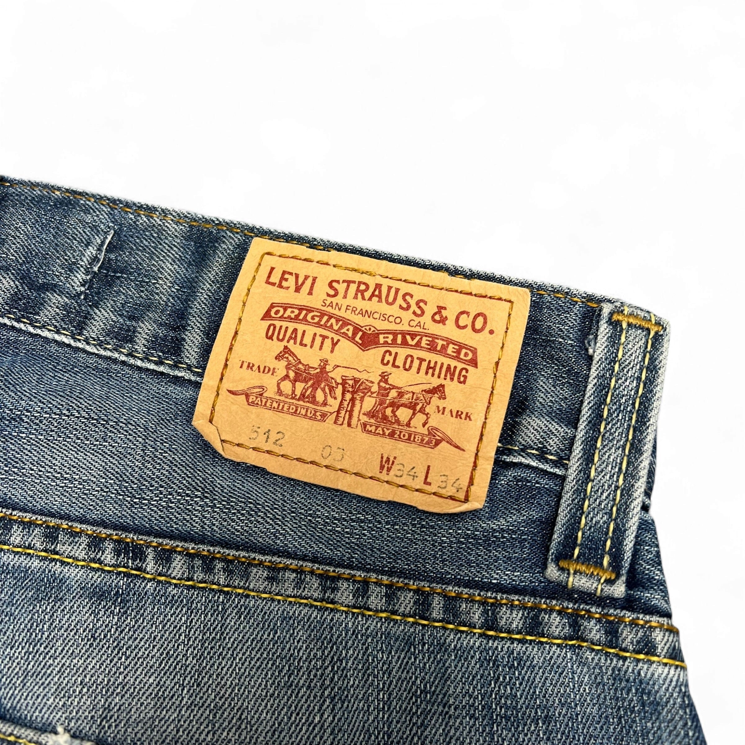TWC Vintage Levi’s 512 Bootcut Jeans mit klassischem Leder-Label und gelben Kontrastnähten