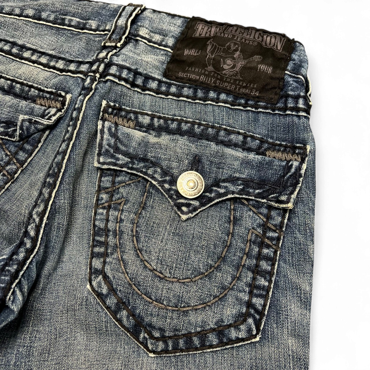 TWC Vintage True Religion Billy Super T Bootcut Jeans in blauem Denim mit markanten Kontrastnähten und Gesäßtaschen
