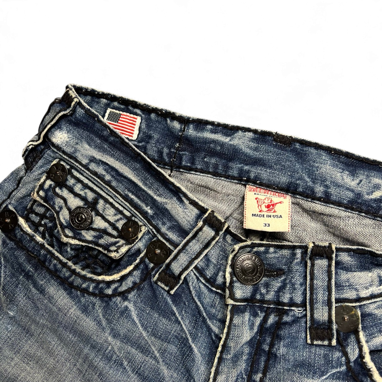 TWC Vintage True Religion Joey Super T Bootcut Jeans in blauem Denim mit markanten Kontrastnähten und US-Flaggen-Label