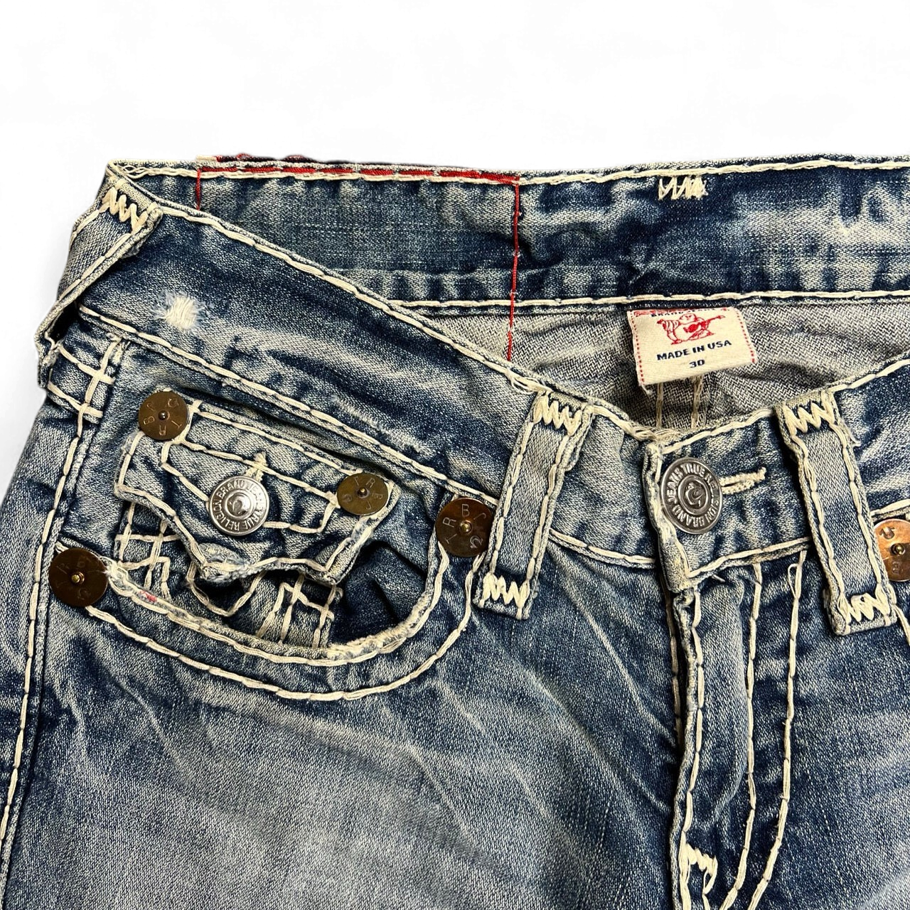TWC Vintage True Religion Joey Super T Bootcut Jeans in blau mit markanten hellen Kontrastnähten und Metalldetails