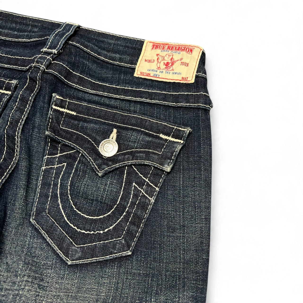 TWC Vintage True Religion Joey Bootcut Jeans in Dunkelblau mit markanten hellen Kontrastnähten und Gesäßtaschen