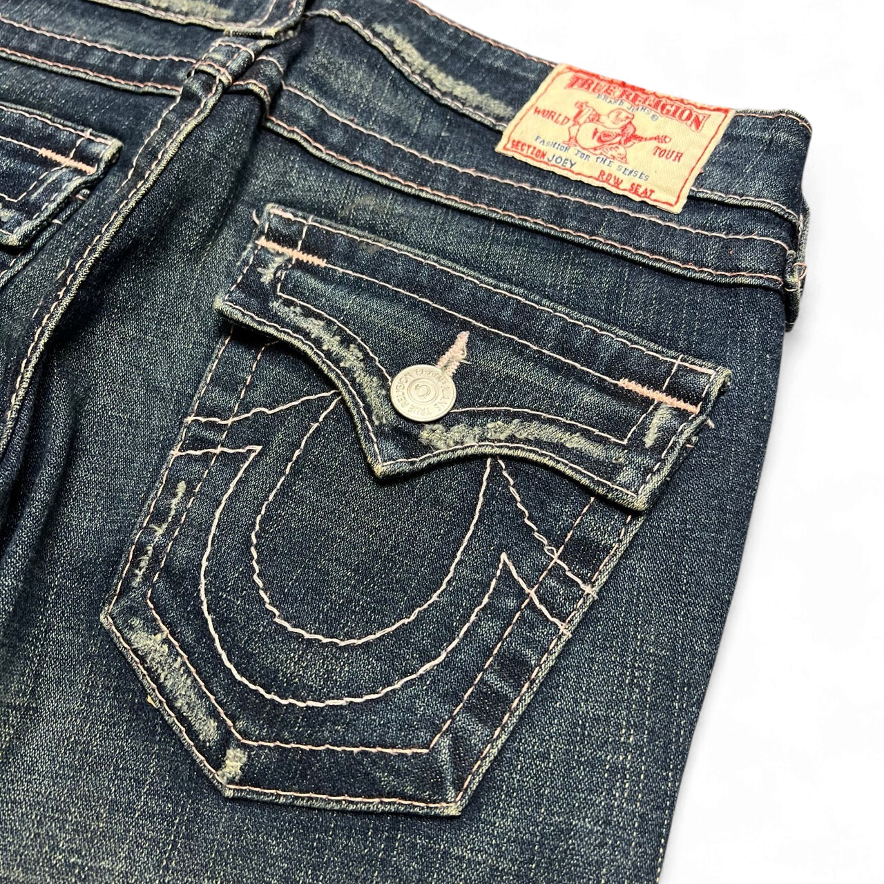TWC Vintage True Religion Joey Bootcut Jeans in dunkelblauem Denim mit markanten Kontrastnähten und Gesäßtaschen