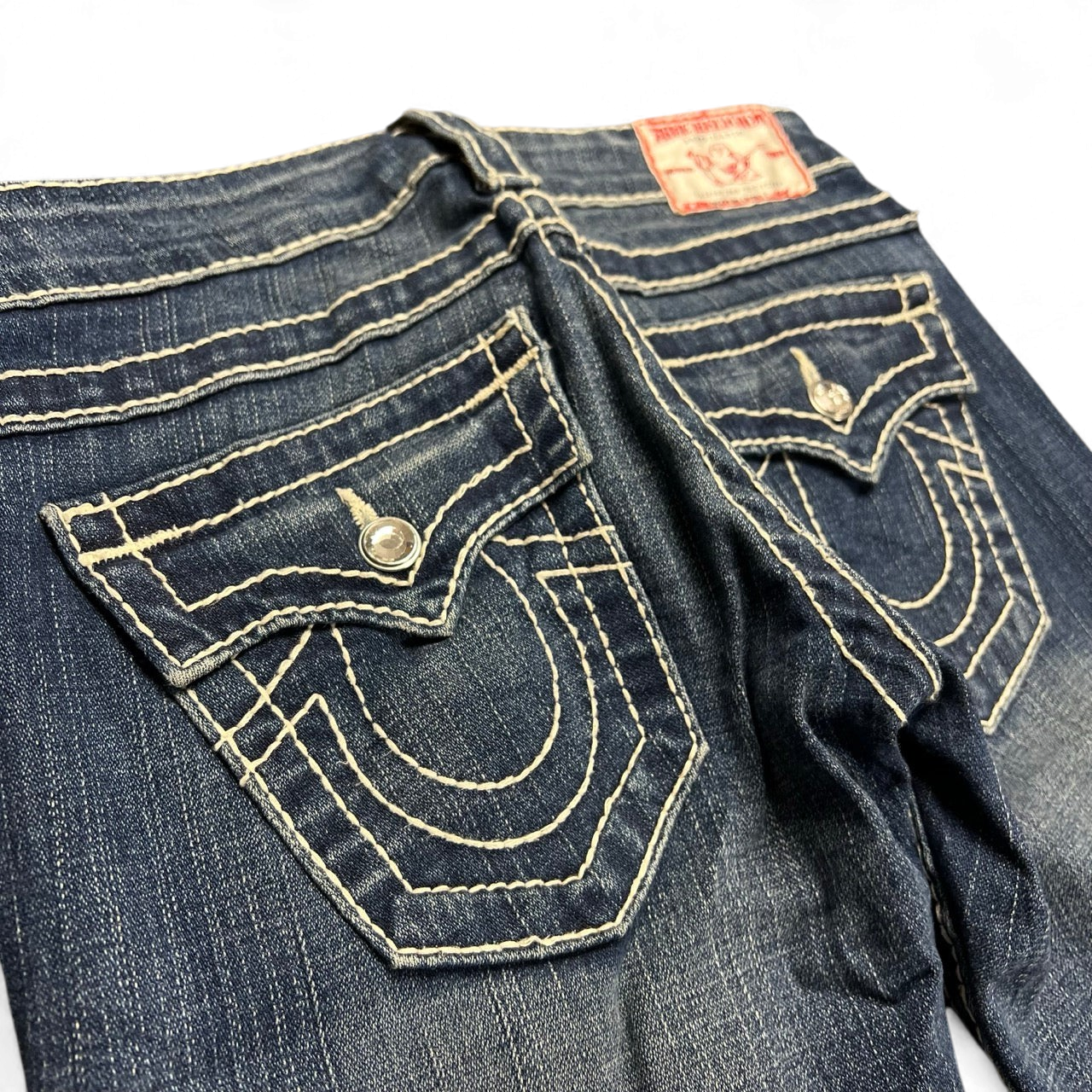 TWC Vintage True Religion Disco Billy Big T Jeans in Blau mit markanten hellen Kontrastnähten und Klappentaschen
