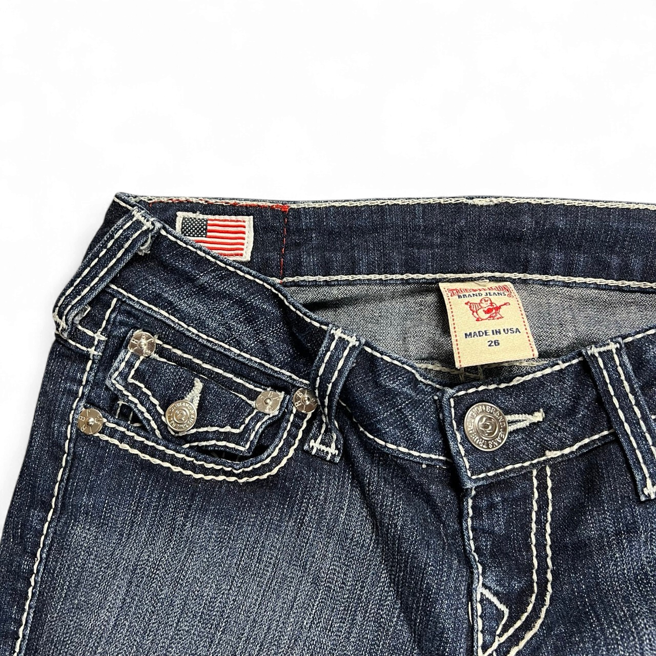 TWC Vintage True Religion Becky Bootcut Jeans in Dunkelblau mit markanten Kontrastnähten und US-Flaggen-Detail