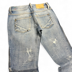 TWC Vintage Diesel Lhela Straight Damenjeans in hellem Denim mit Used-Optik und Leder-Patch auf der Rückseite